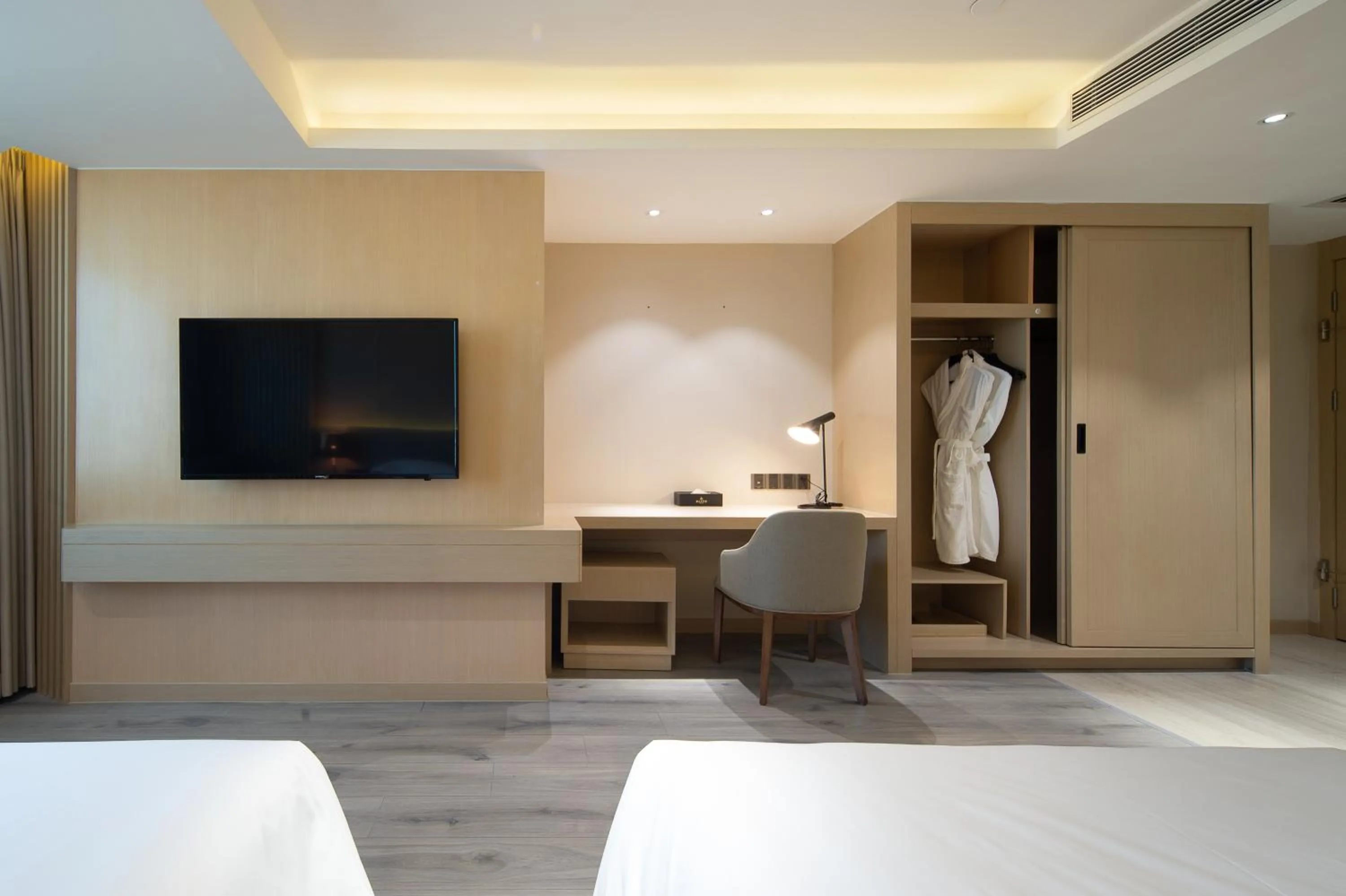 Bed in ELITE International Hotel Taikoo Hui Plaza Gangding Metro Station Branch