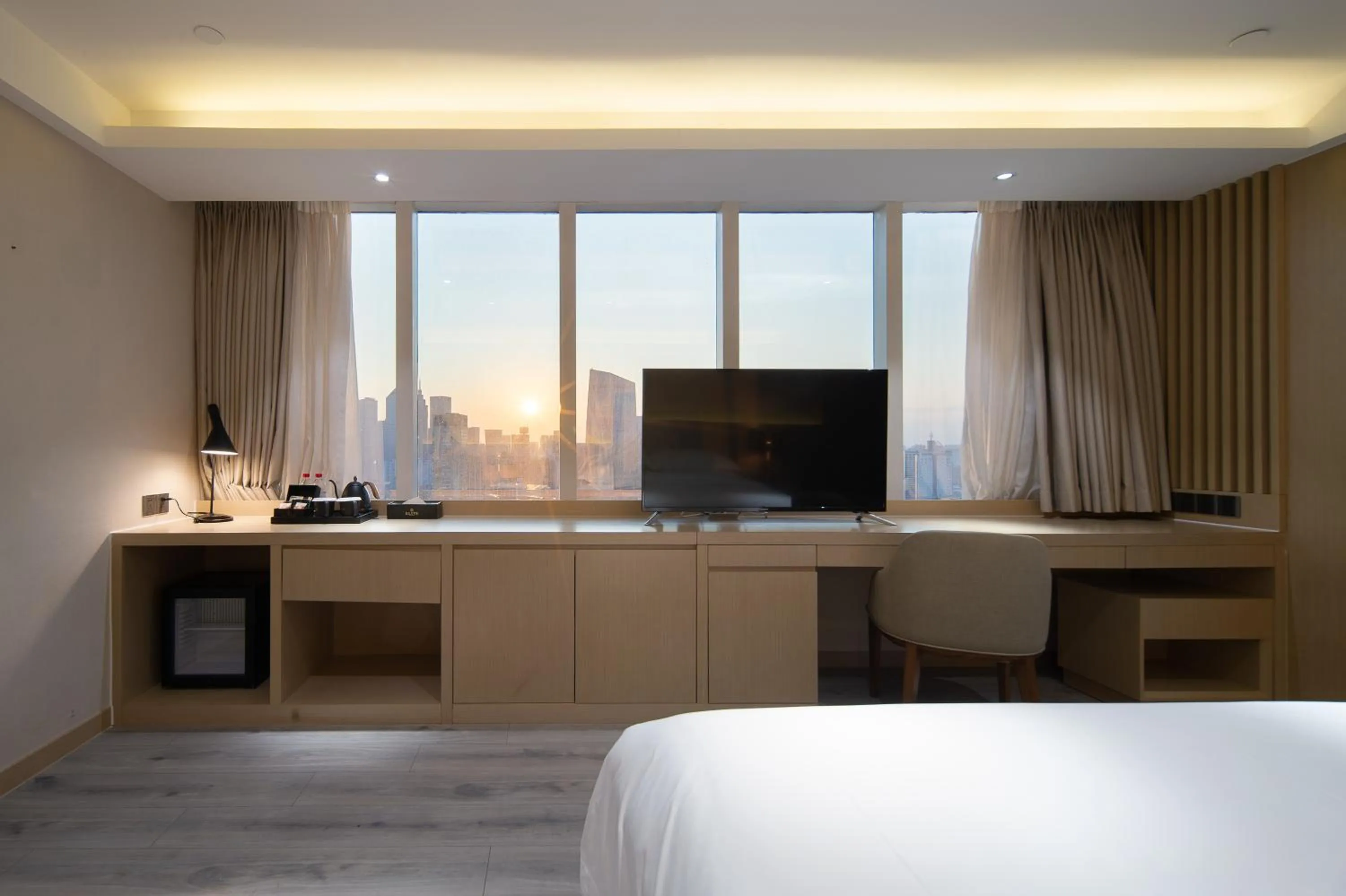Bed in ELITE International Hotel Taikoo Hui Plaza Gangding Metro Station Branch