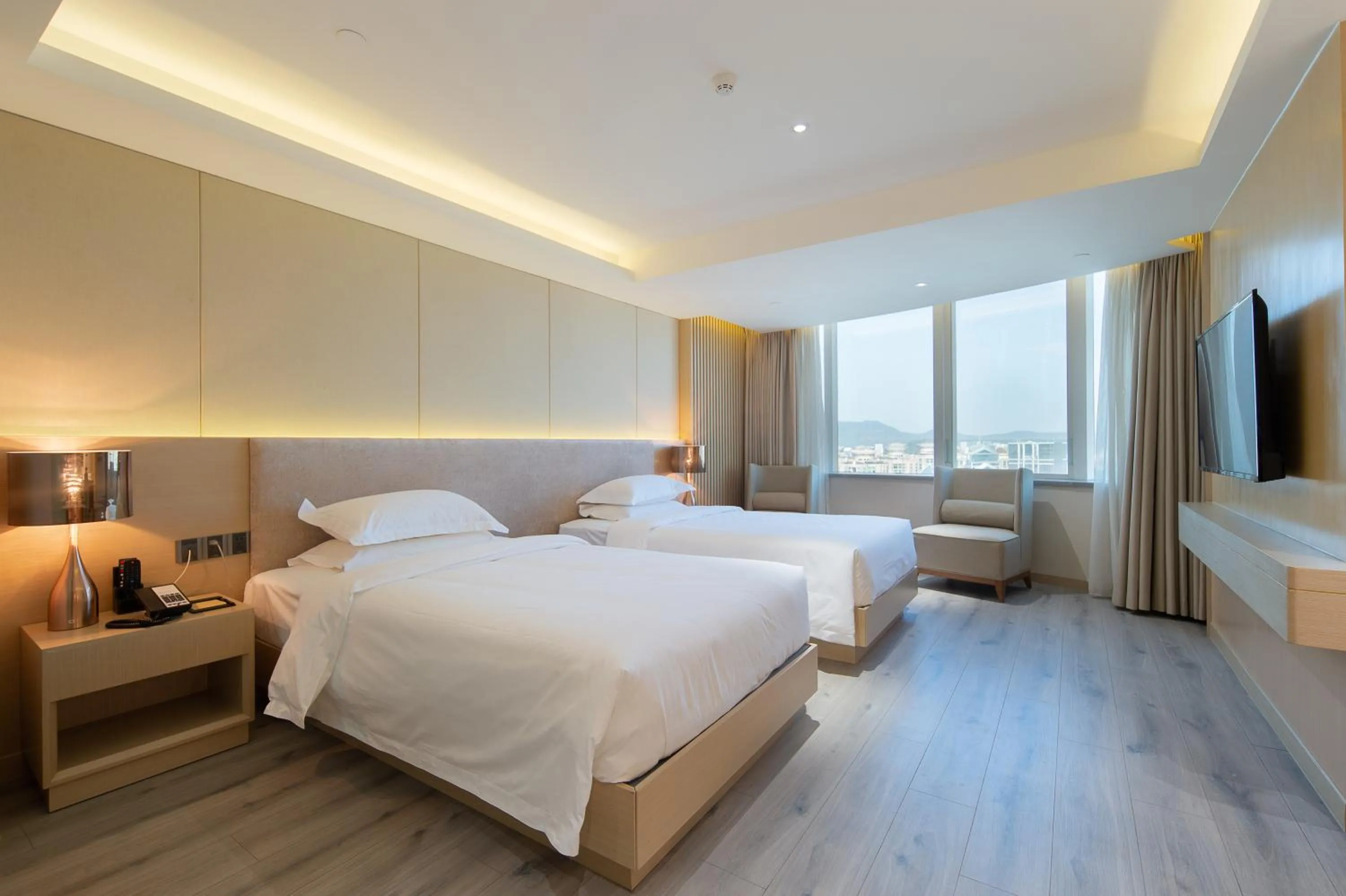 Bed in ELITE International Hotel Taikoo Hui Plaza Gangding Metro Station Branch