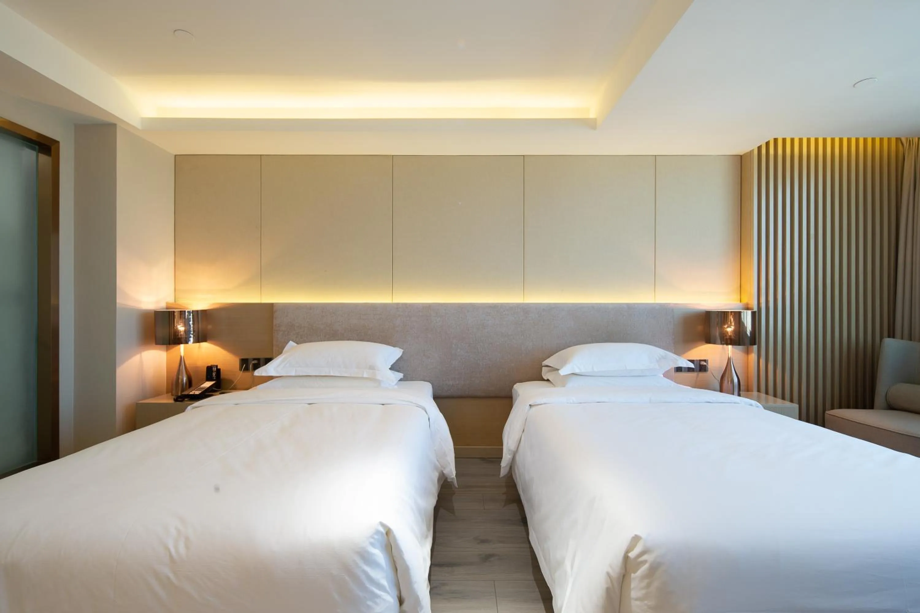 Bed in ELITE International Hotel Taikoo Hui Plaza Gangding Metro Station Branch