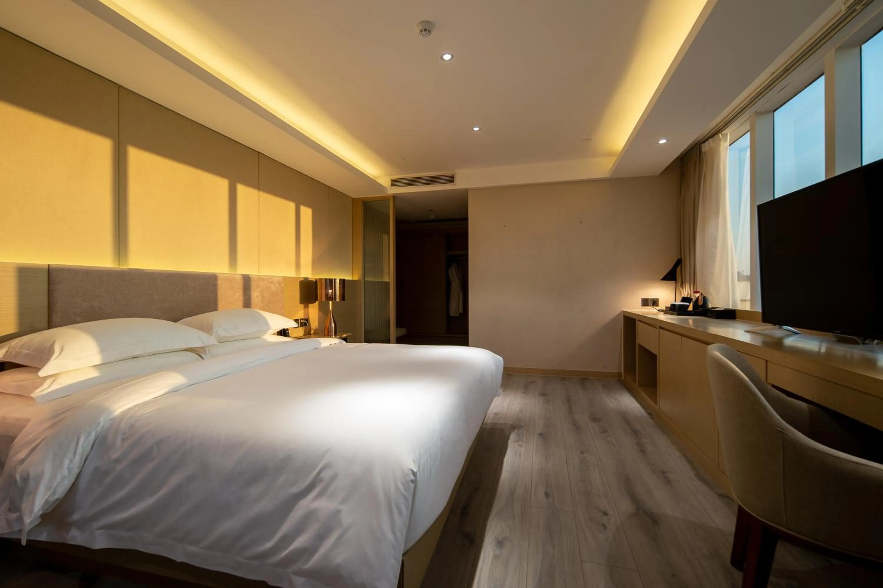 Bed in ELITE International Hotel Taikoo Hui Plaza Gangding Metro Station Branch