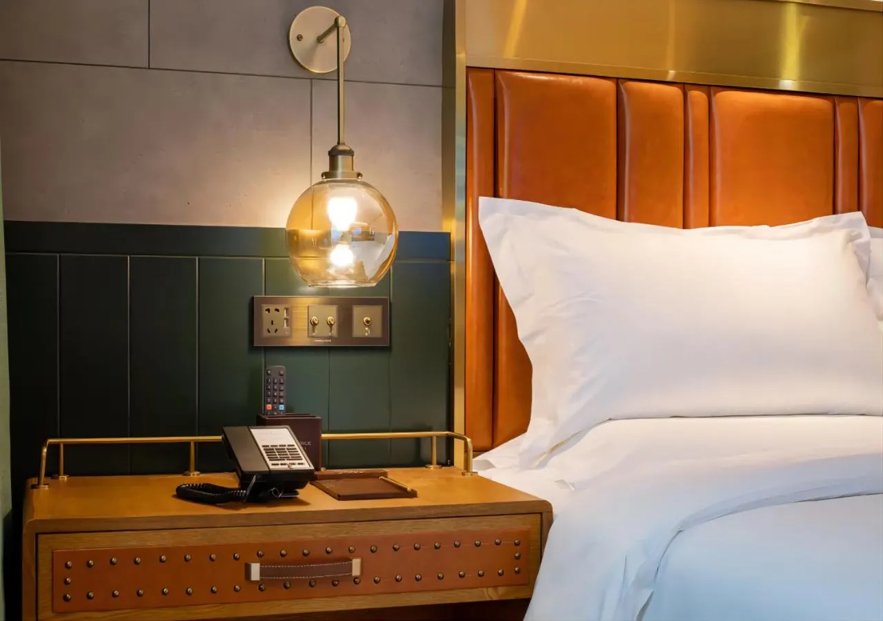 Bed in ELITE International Hotel Taikoo Hui Plaza Gangding Metro Station Branch