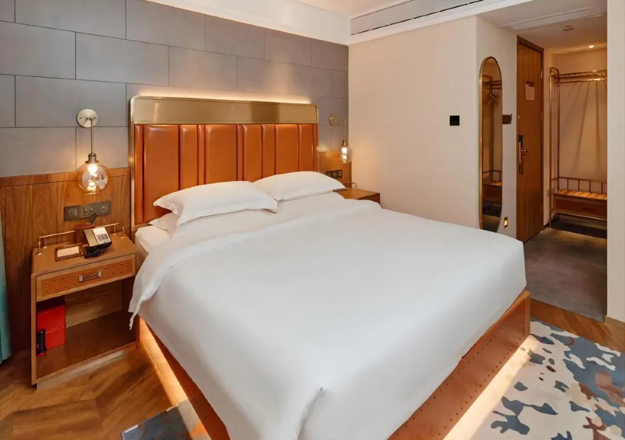 Bed in ELITE International Hotel Taikoo Hui Plaza Gangding Metro Station Branch