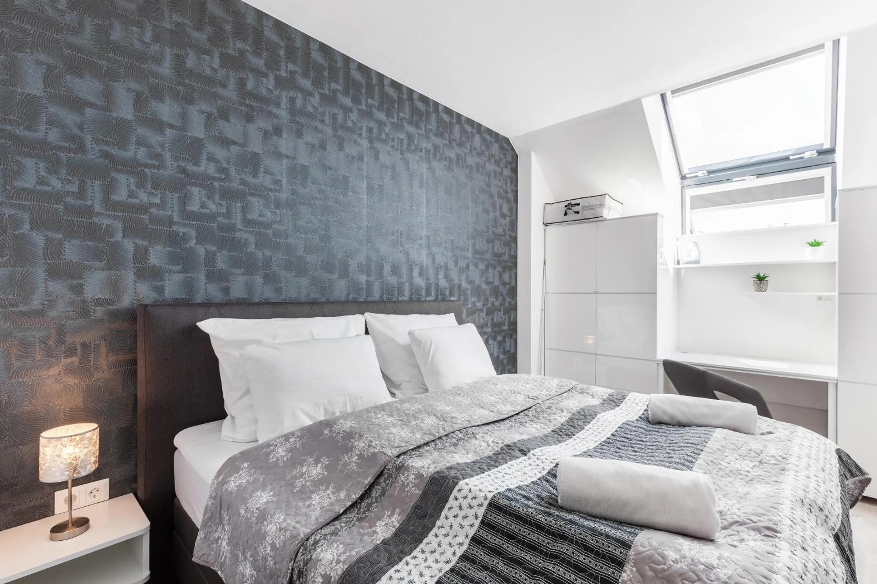 Bed in Chill 'N' Joy Boutique suites