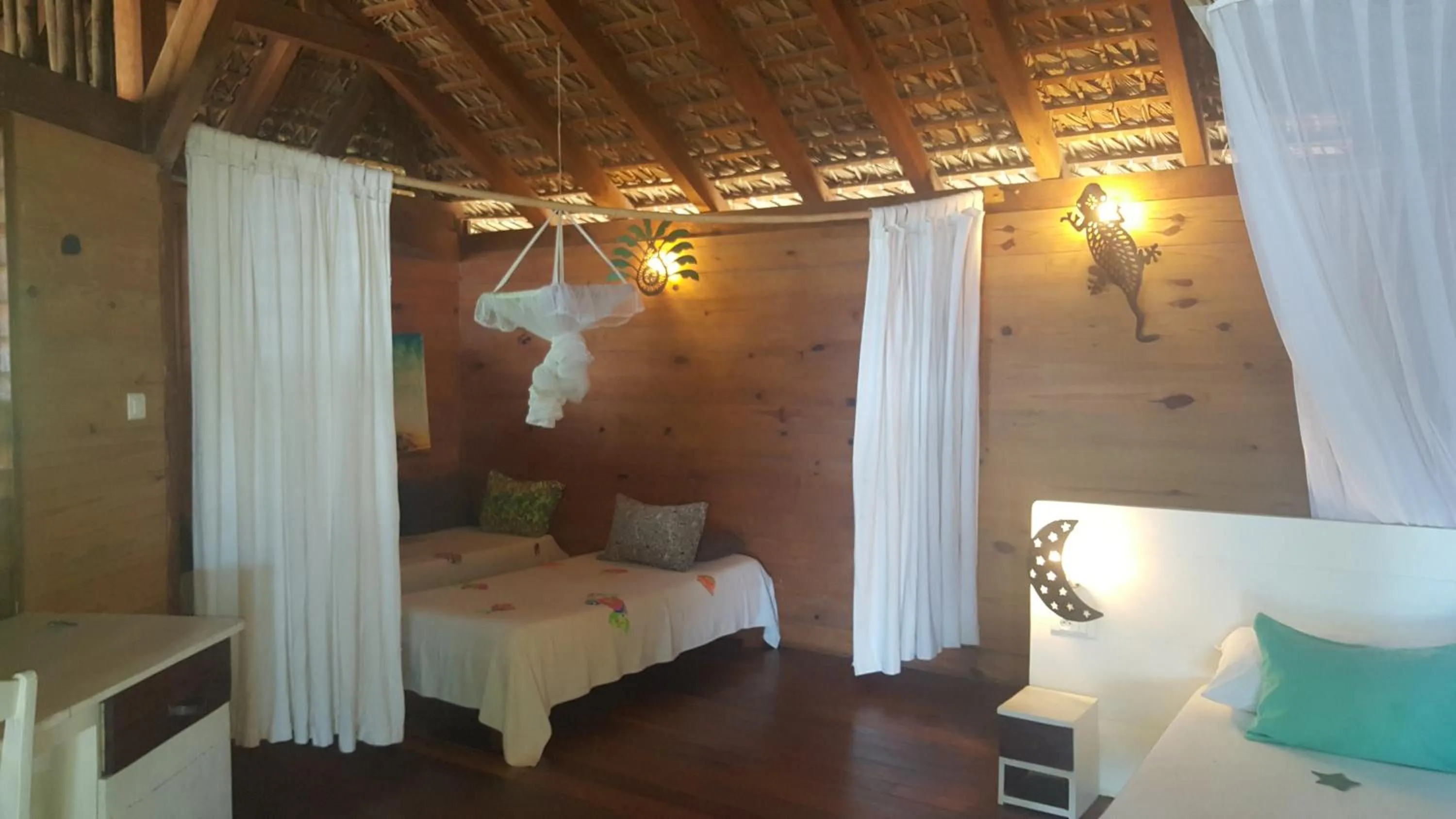 Seating area, Bed in Anjiamarango Beach Resort