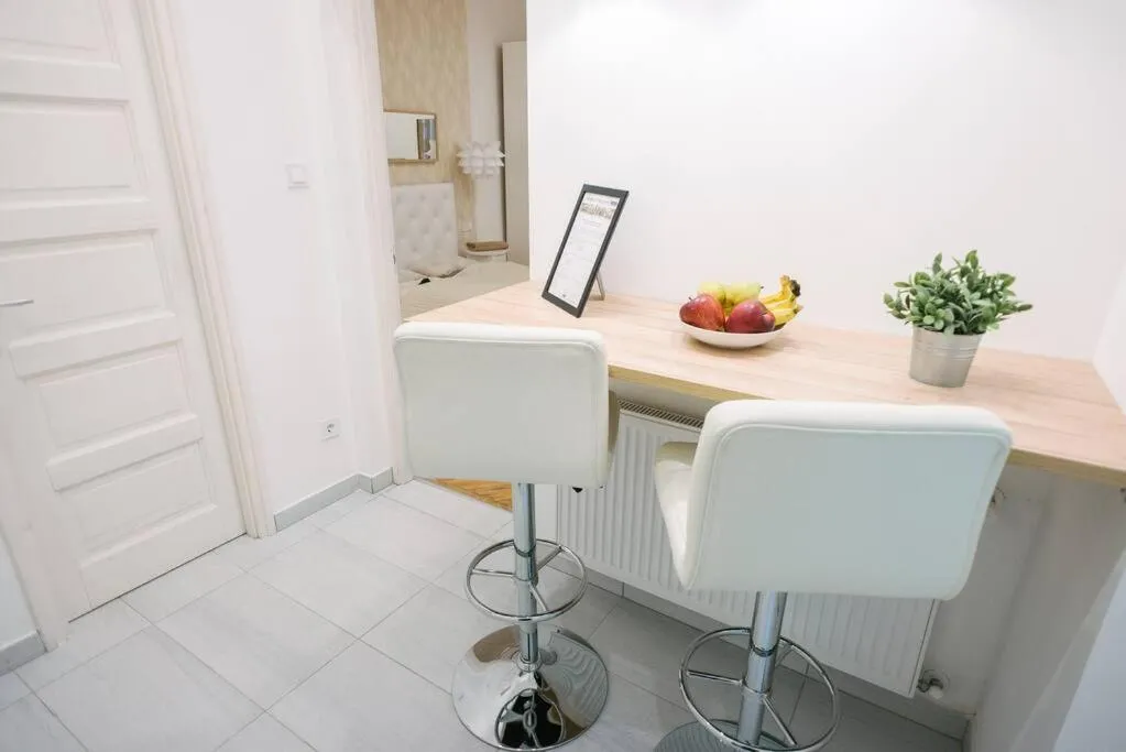 Dining area in Stylish Apartment at Parliament