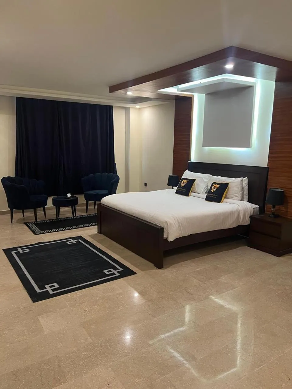 Seating area, Bed in BULAND HEIGHTS