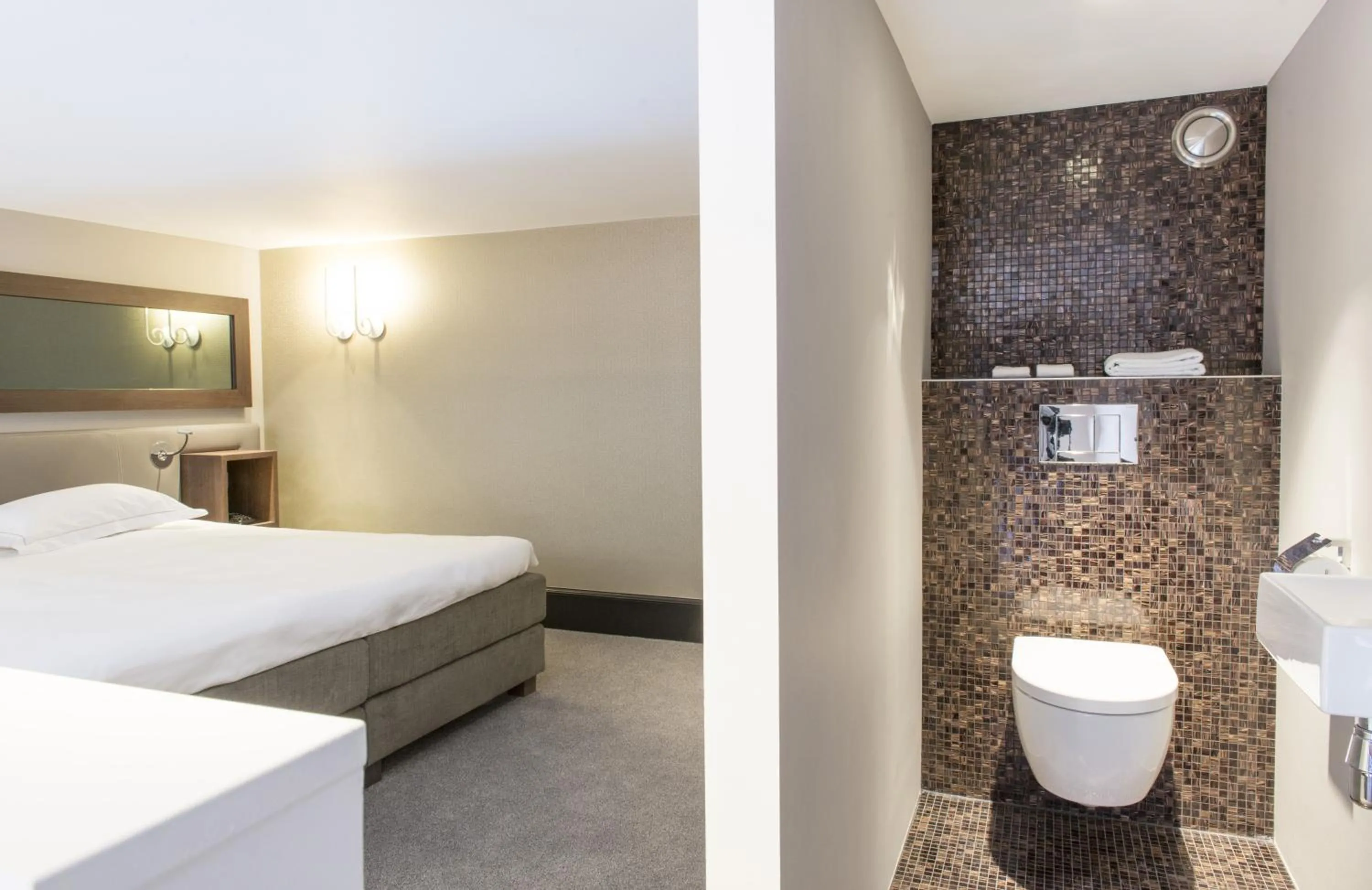 Toilet, Bed in The Dylan Amsterdam - The Leading Hotels of the World