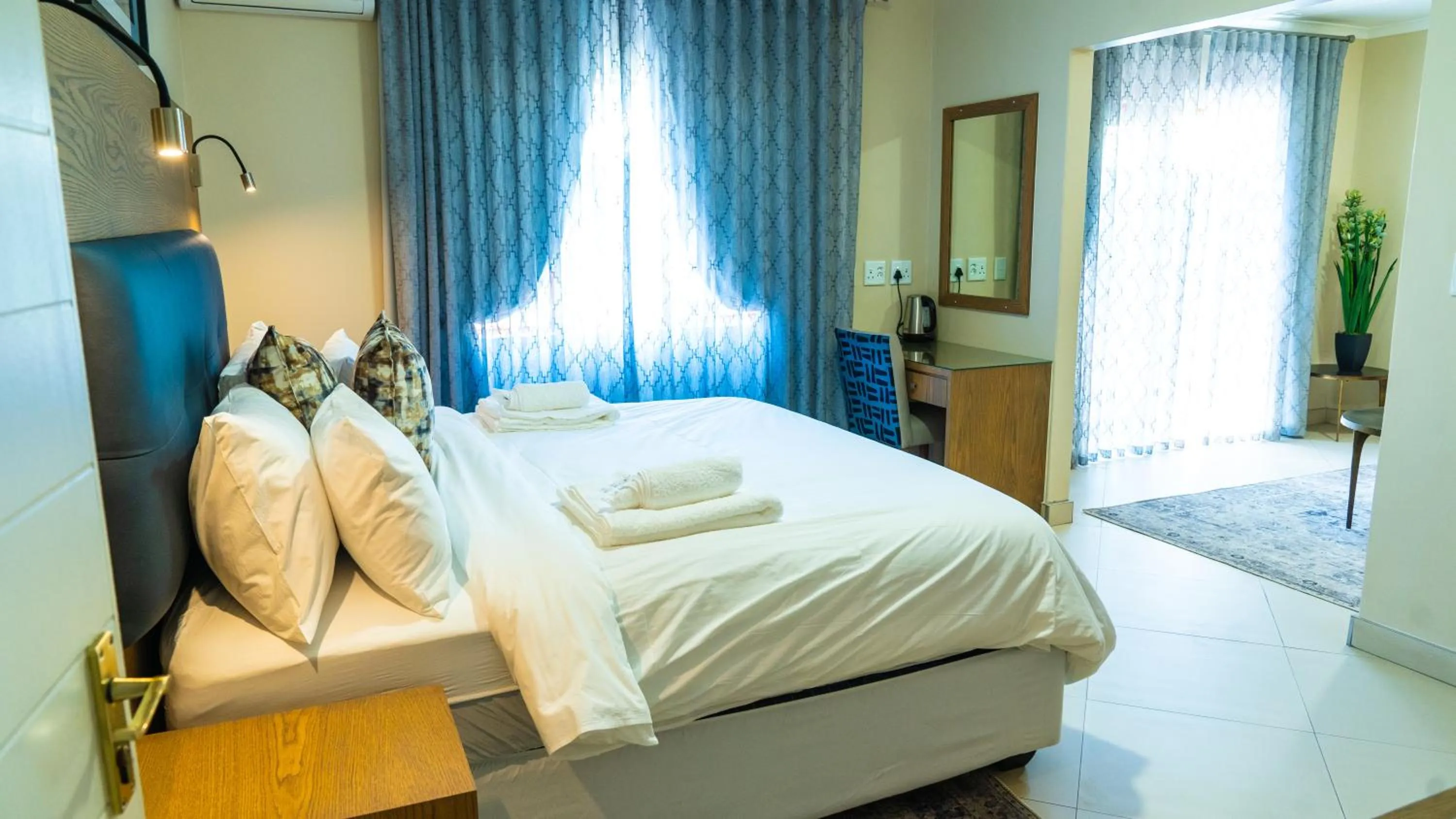 Photo of the whole room, Bed in Windhoek Gardens Boutique Hotel