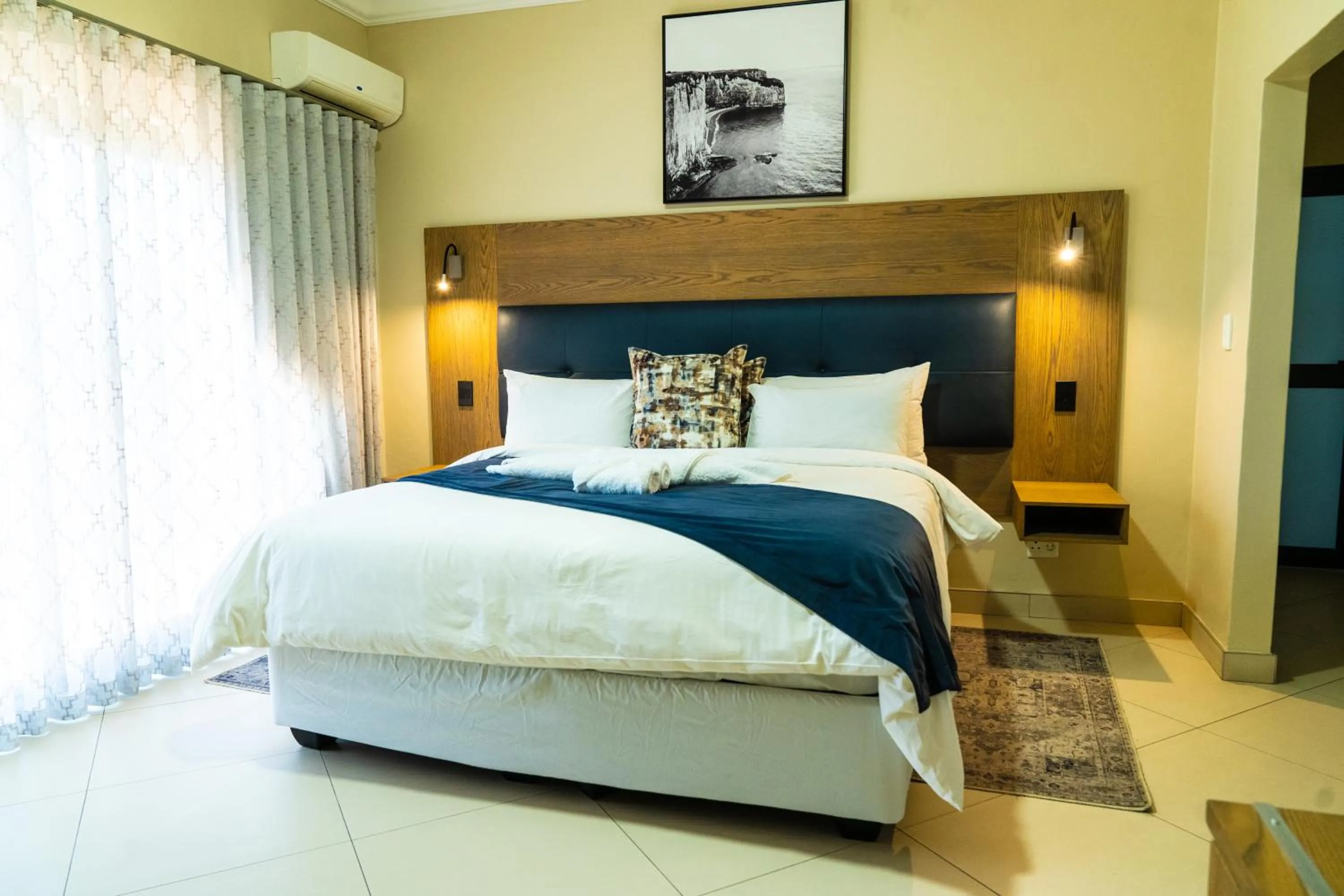 Photo of the whole room, Bed in Windhoek Gardens Boutique Hotel