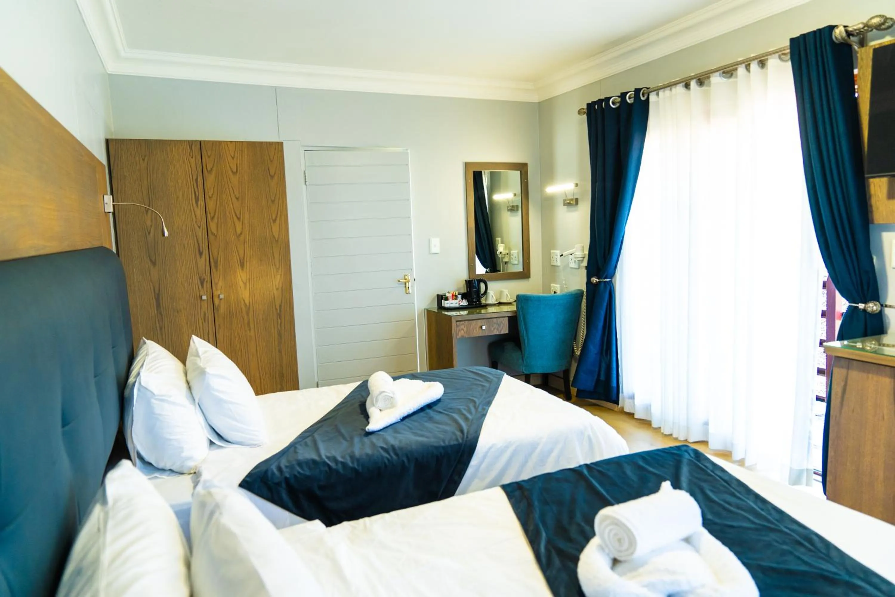 Photo of the whole room, Bed in Windhoek Gardens Boutique Hotel