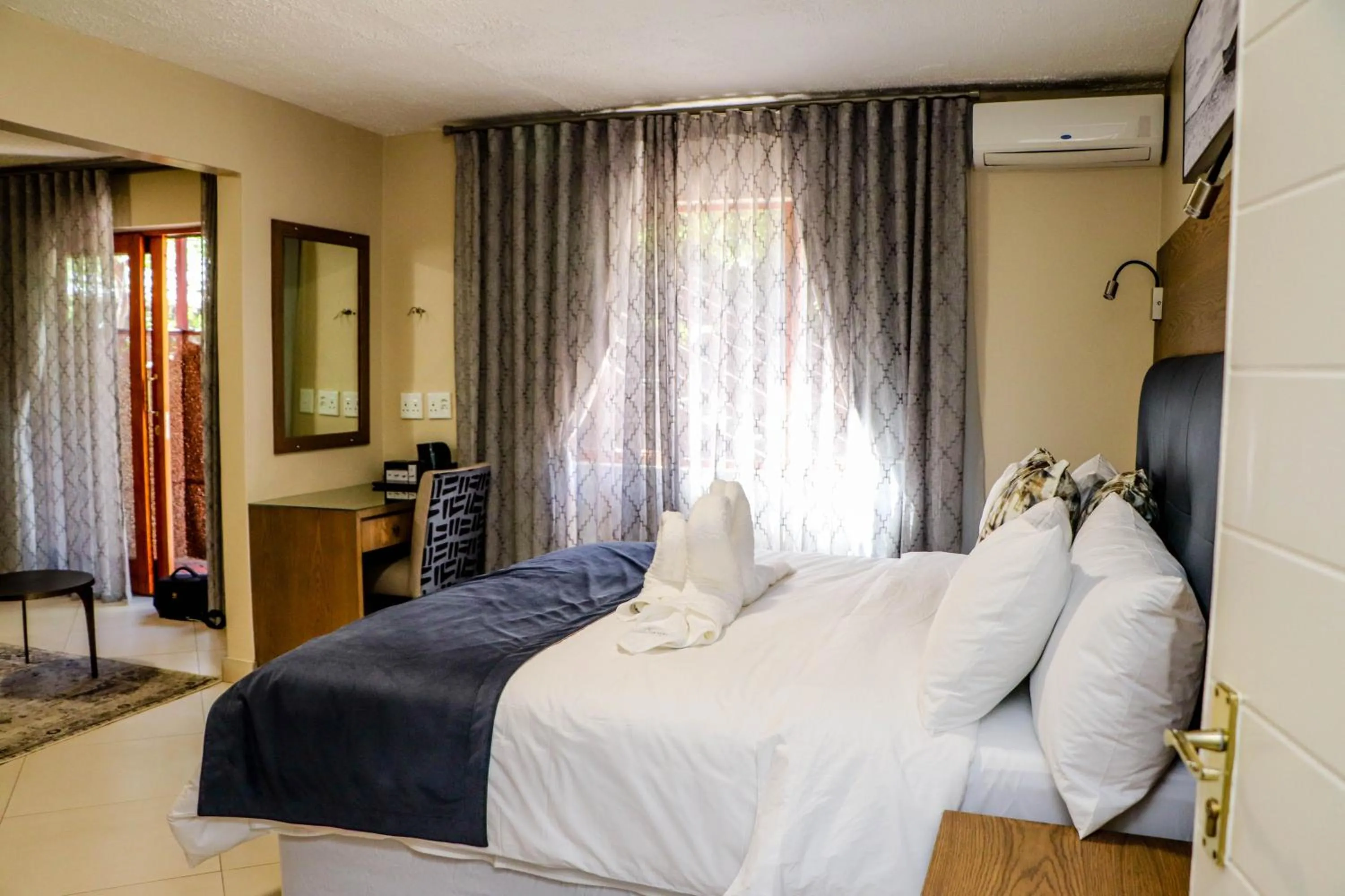 Photo of the whole room, Bed in Windhoek Gardens Boutique Hotel