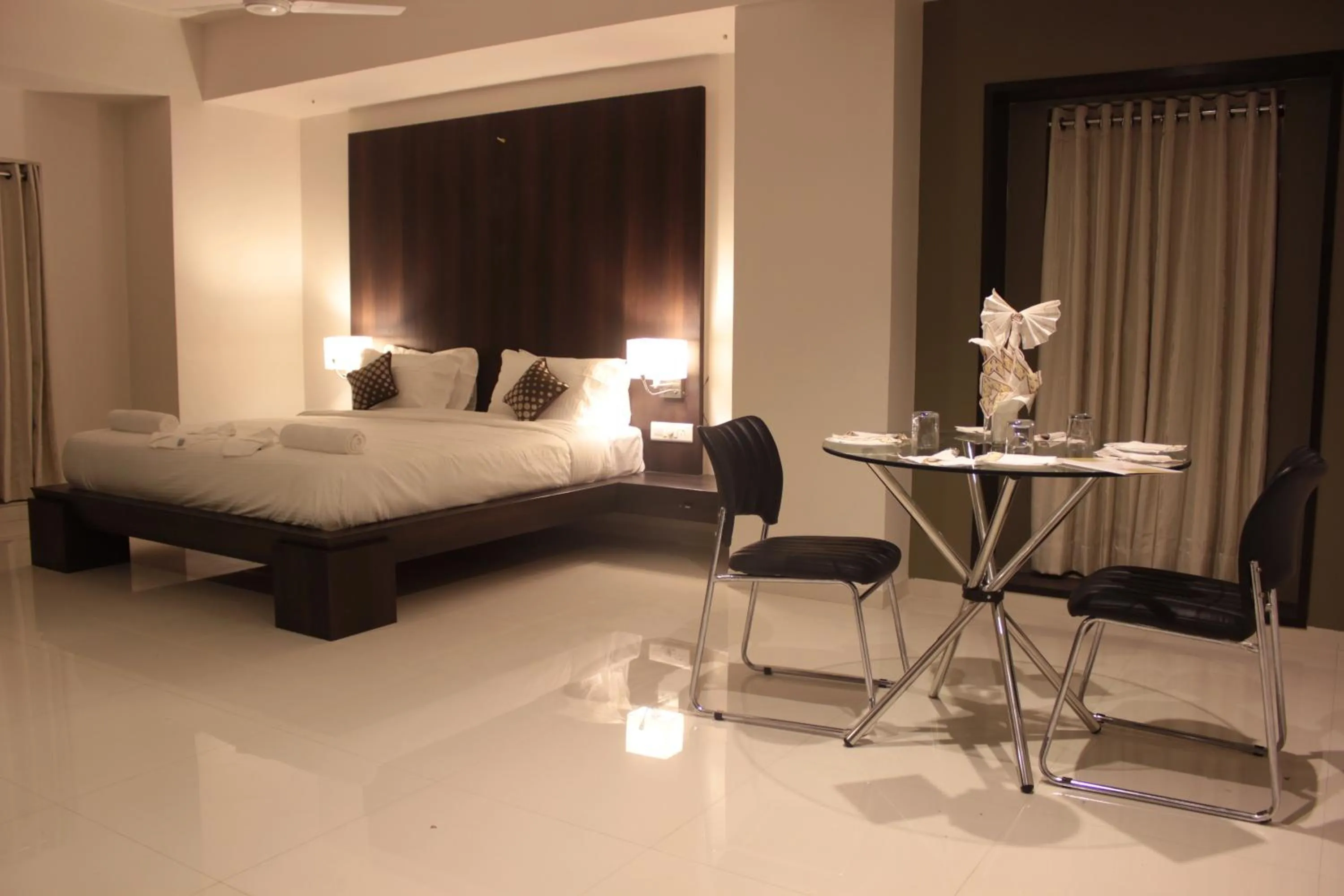 Photo of the whole room, Bed in Hotel Magnum Inn
