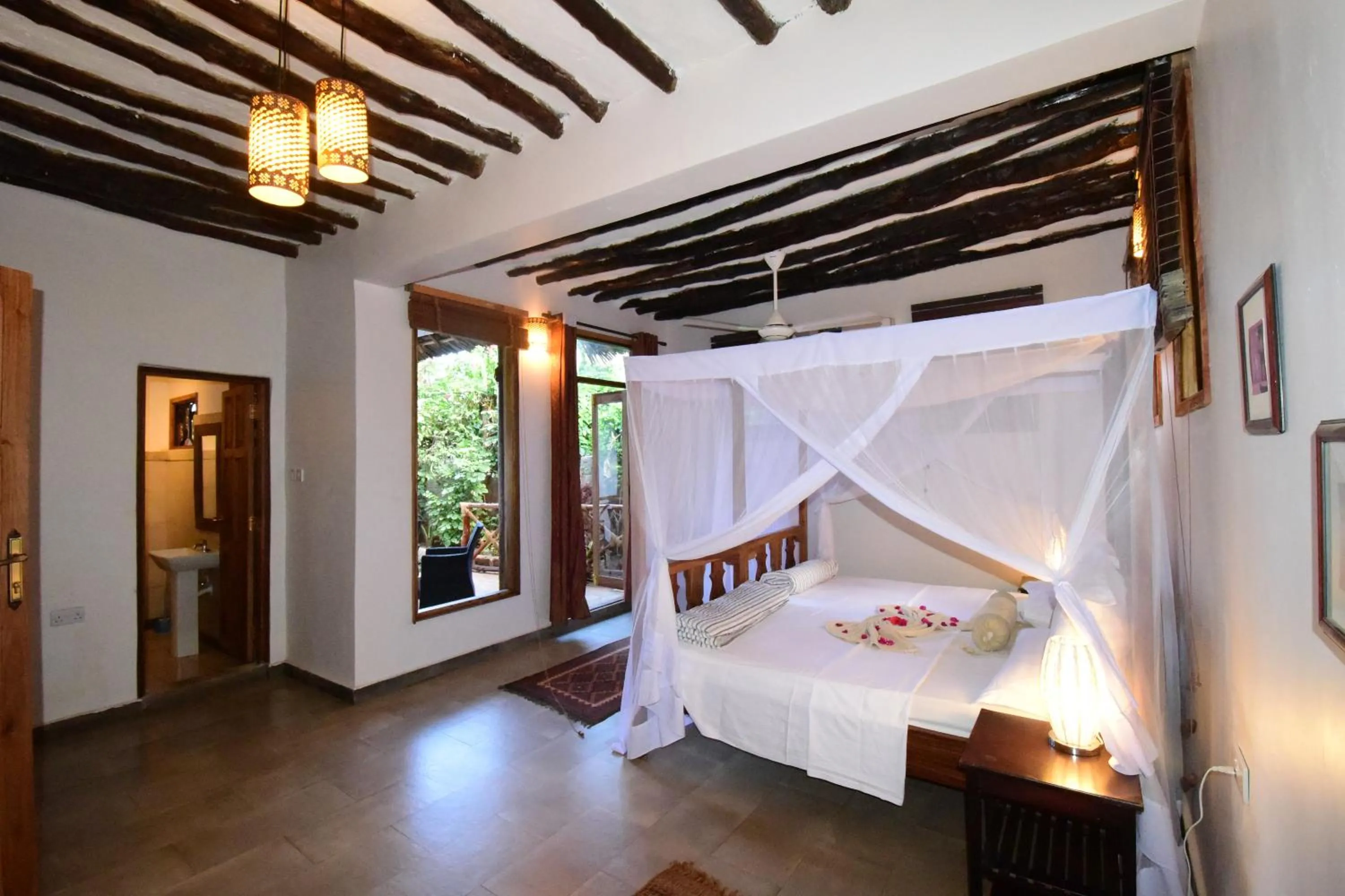 Photo of the whole room, Bed in Tamani Villas