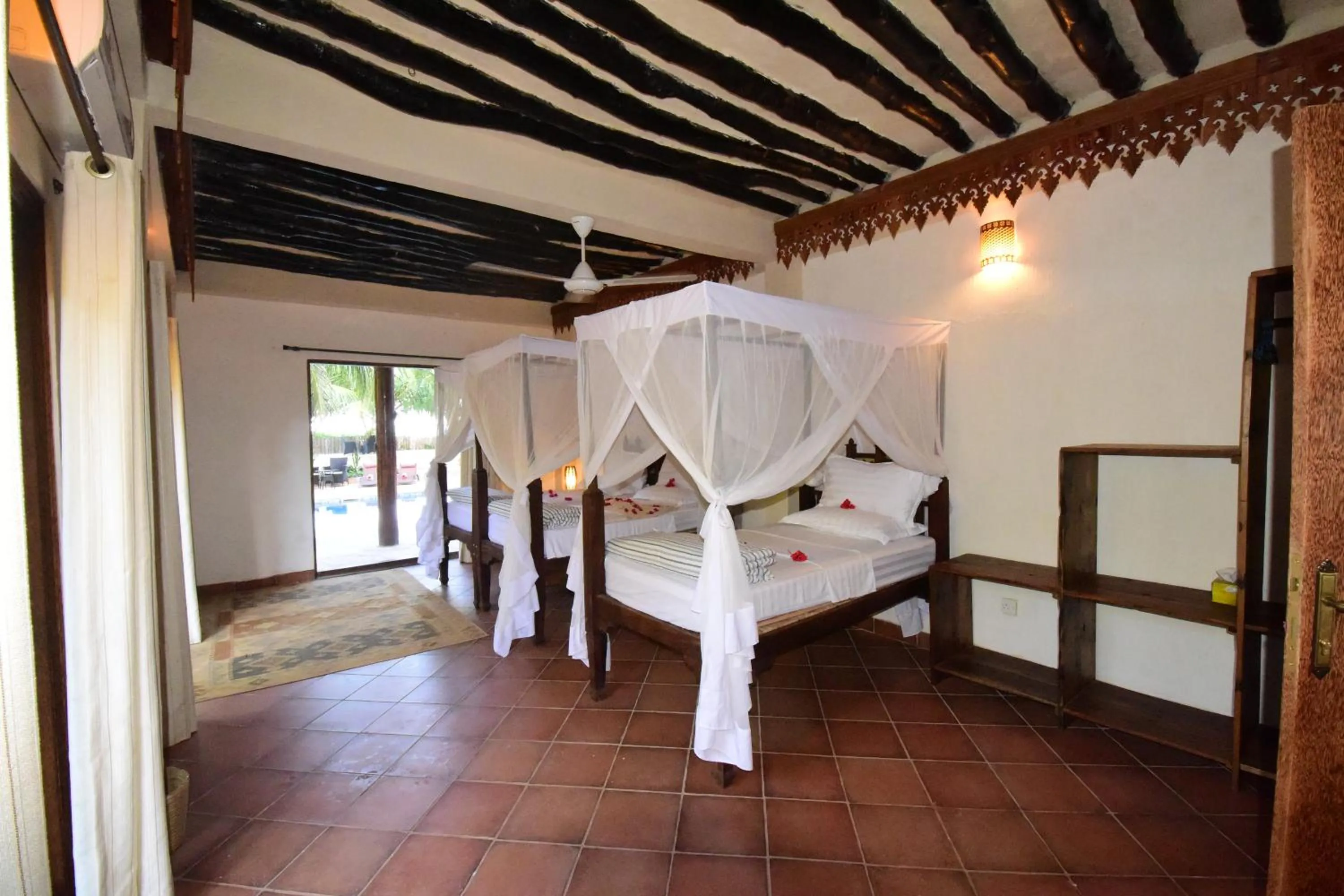 Photo of the whole room, Bed in Tamani Villas