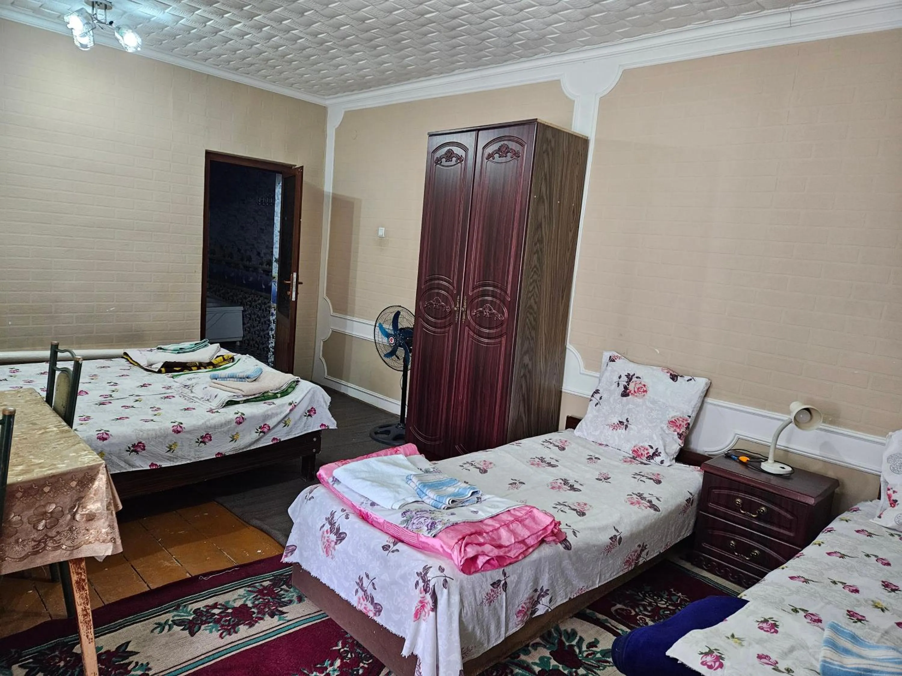 Bed in B&B Bahodir