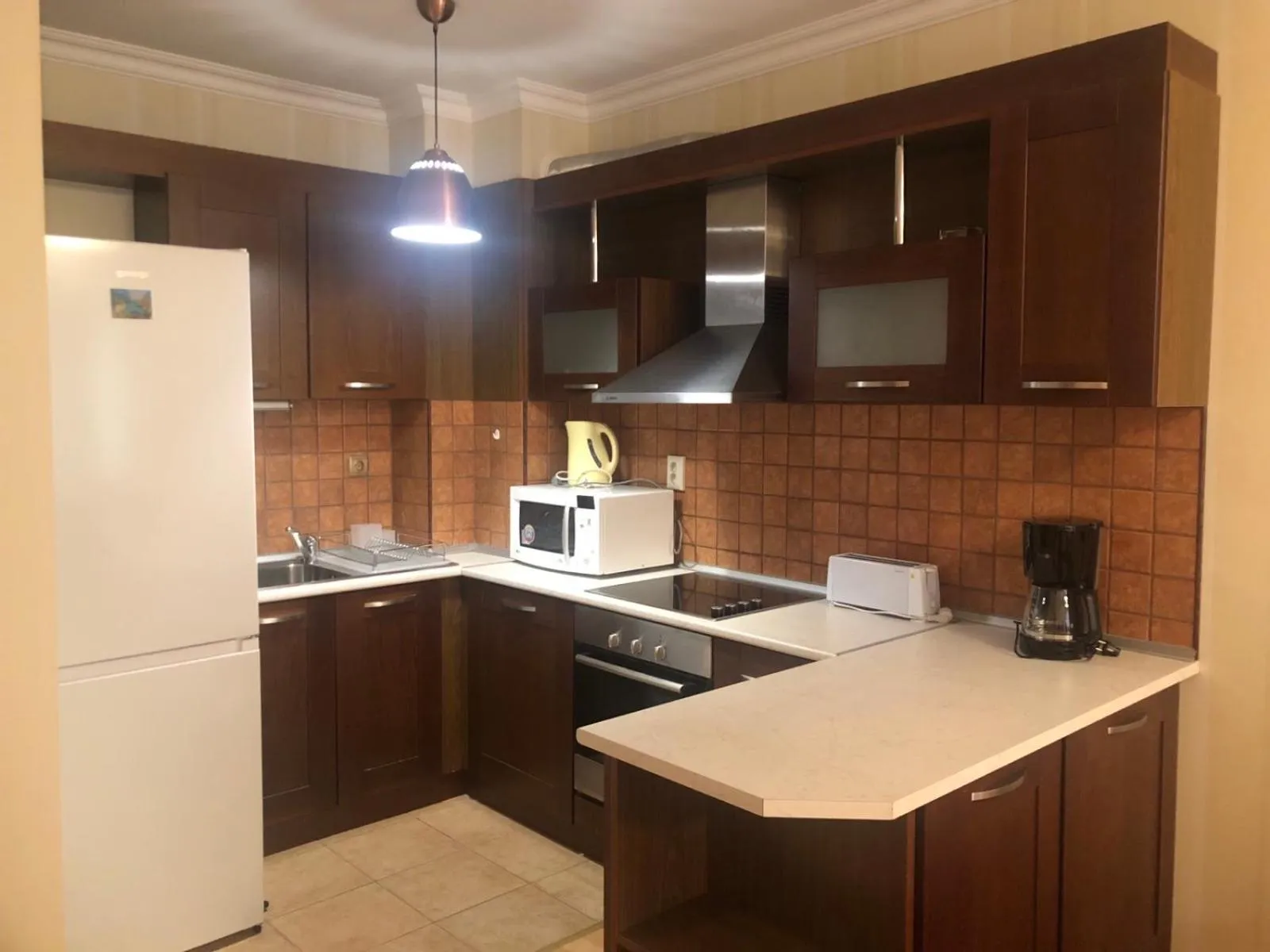 Kitchen or kitchenette in ApartComplex Splendid