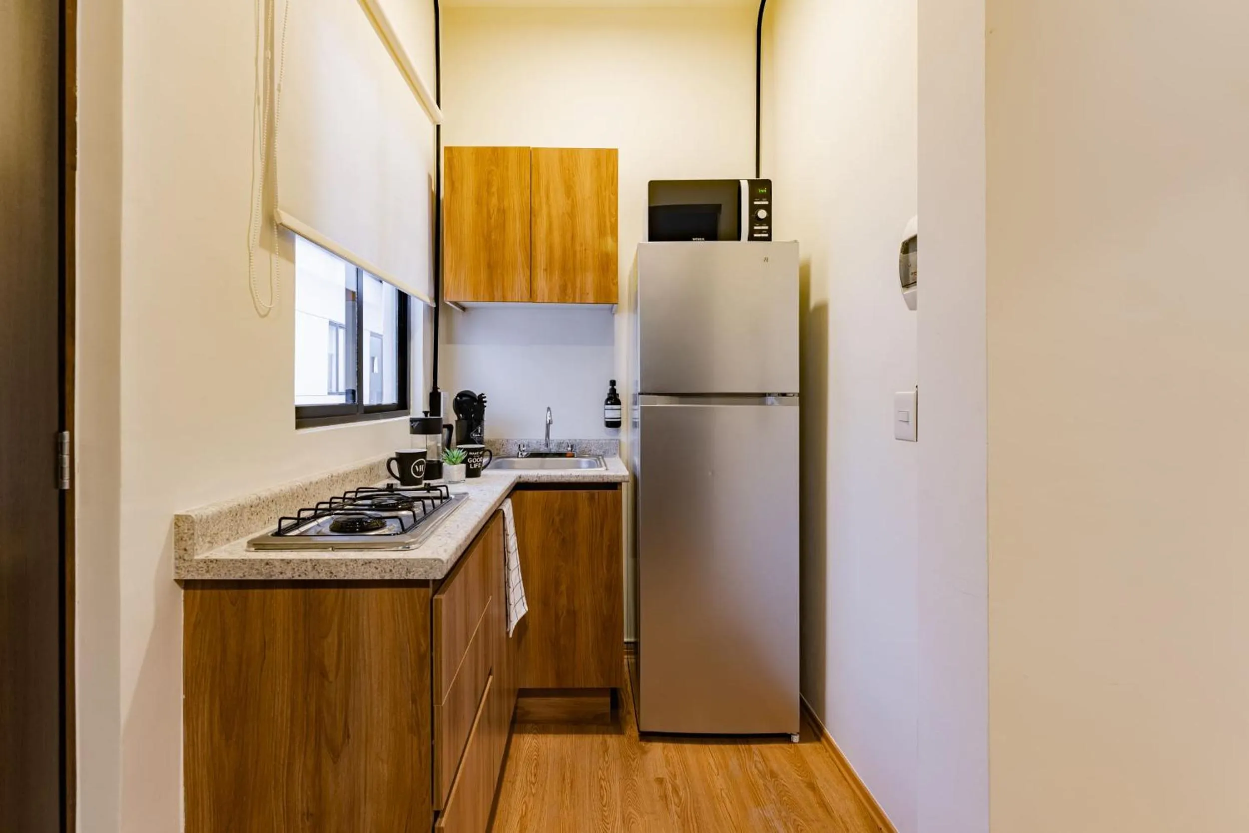 Kitchen or kitchenette in Mariano Escobedo Apartments by VH