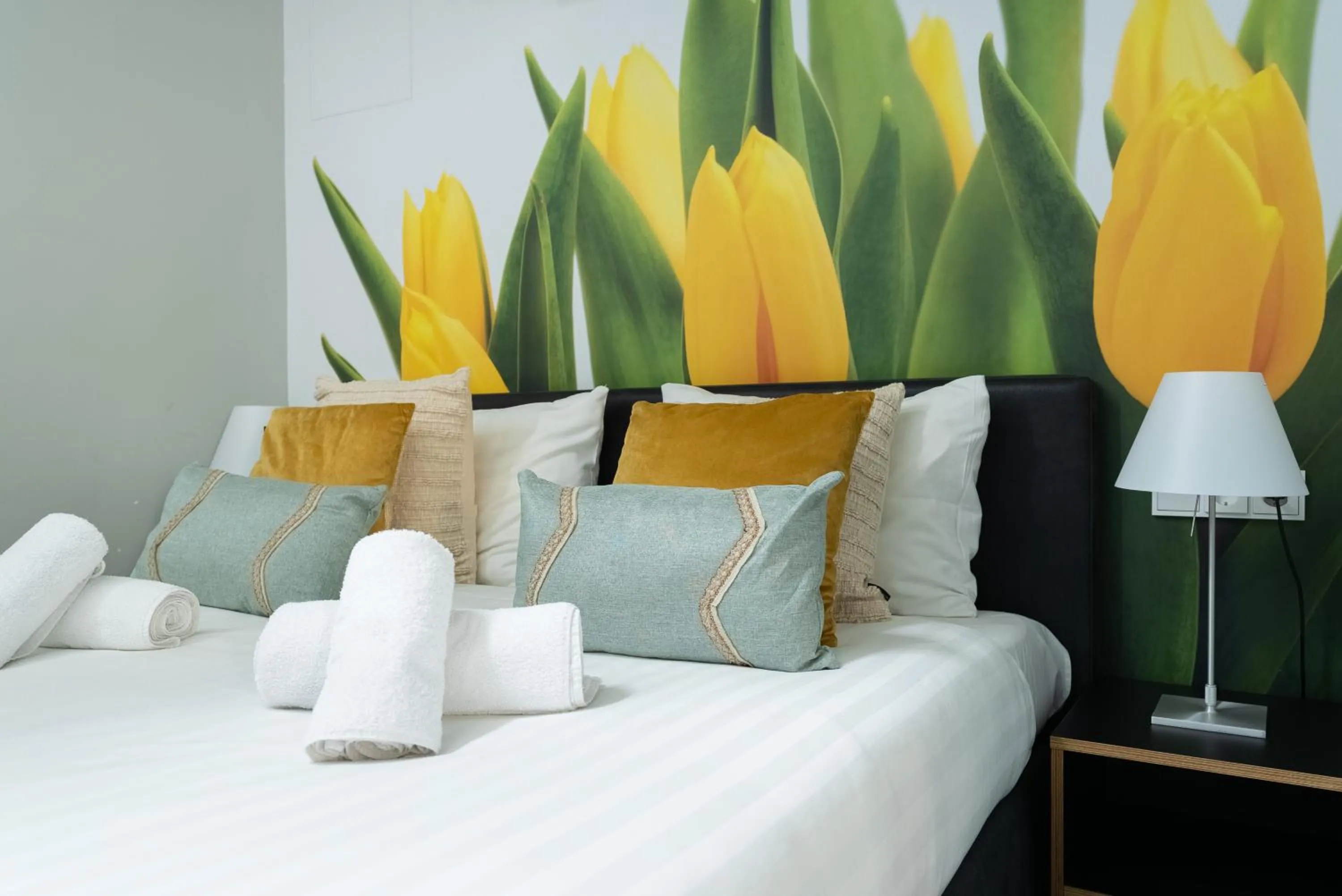 Bed in Multatuli Hotel