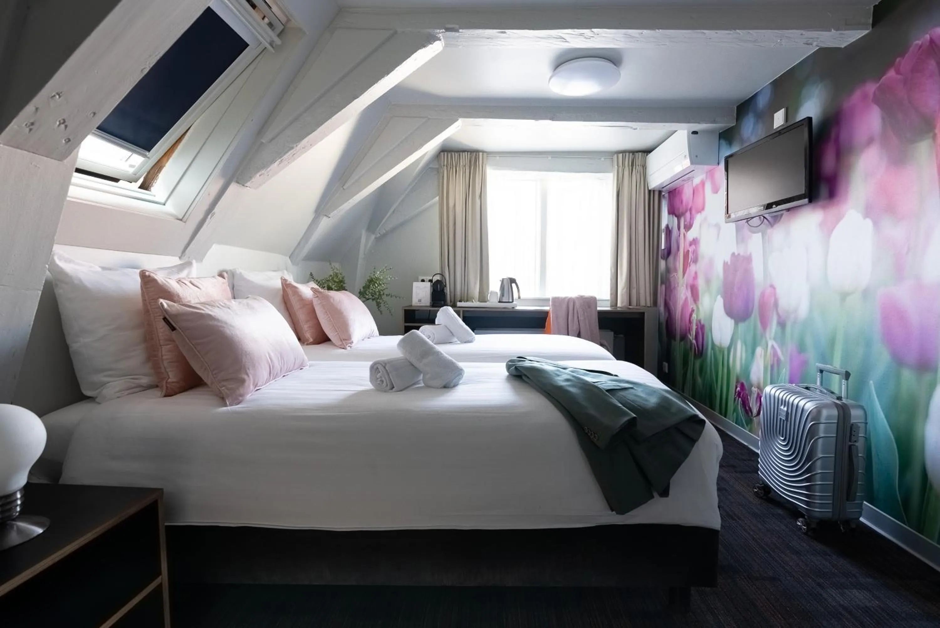 Bed in Multatuli Hotel