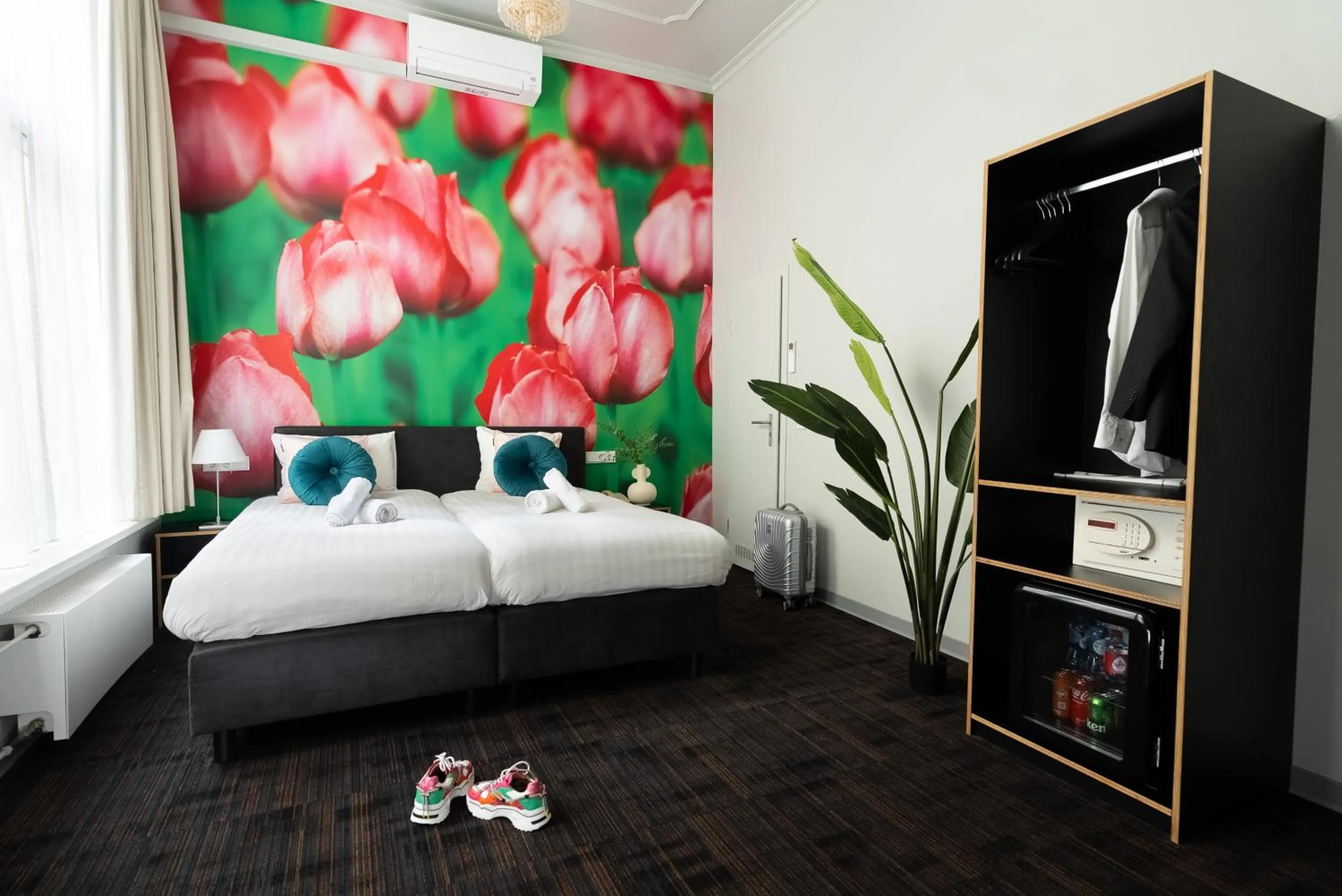 Bed in Multatuli Hotel