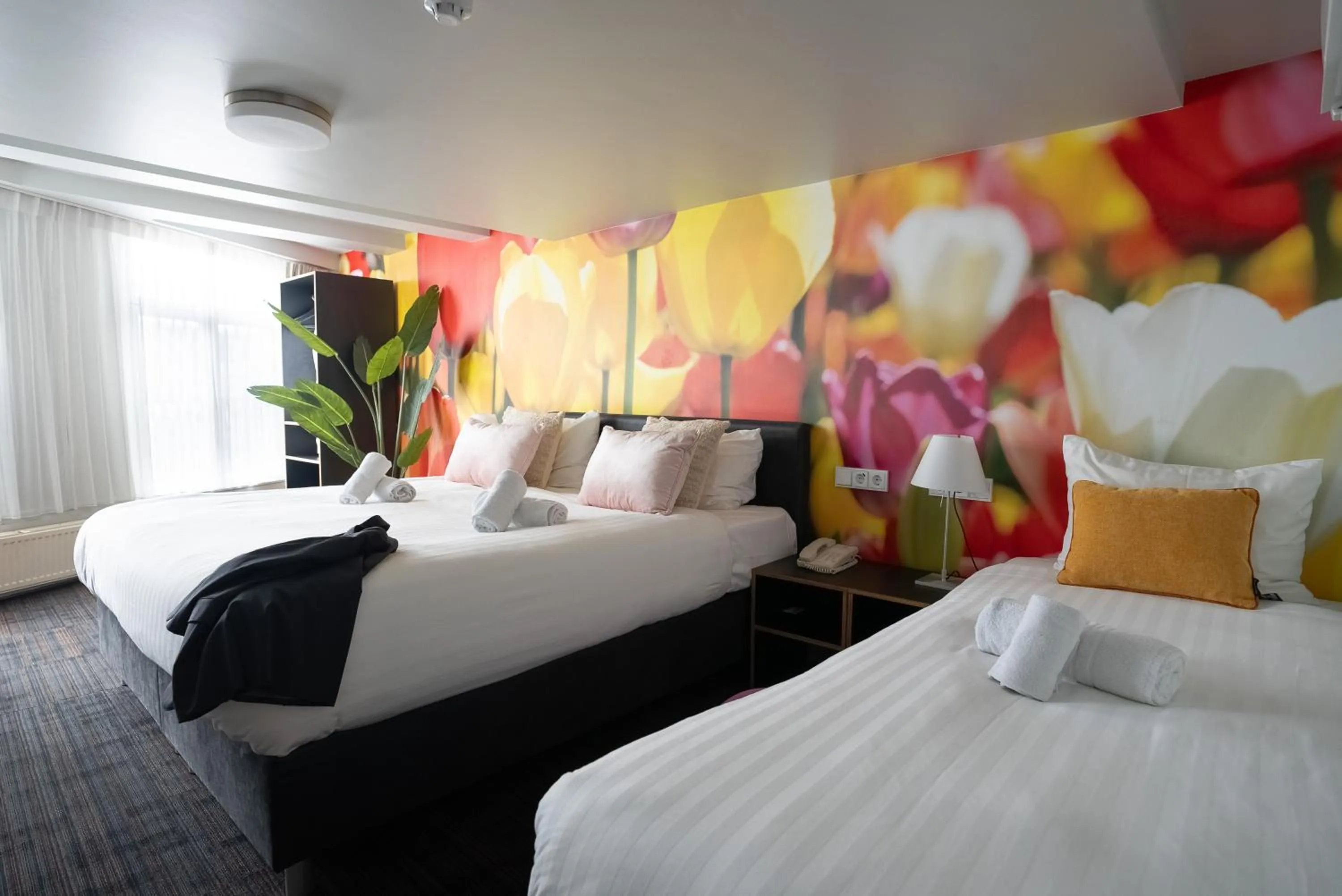 Bed in Multatuli Hotel