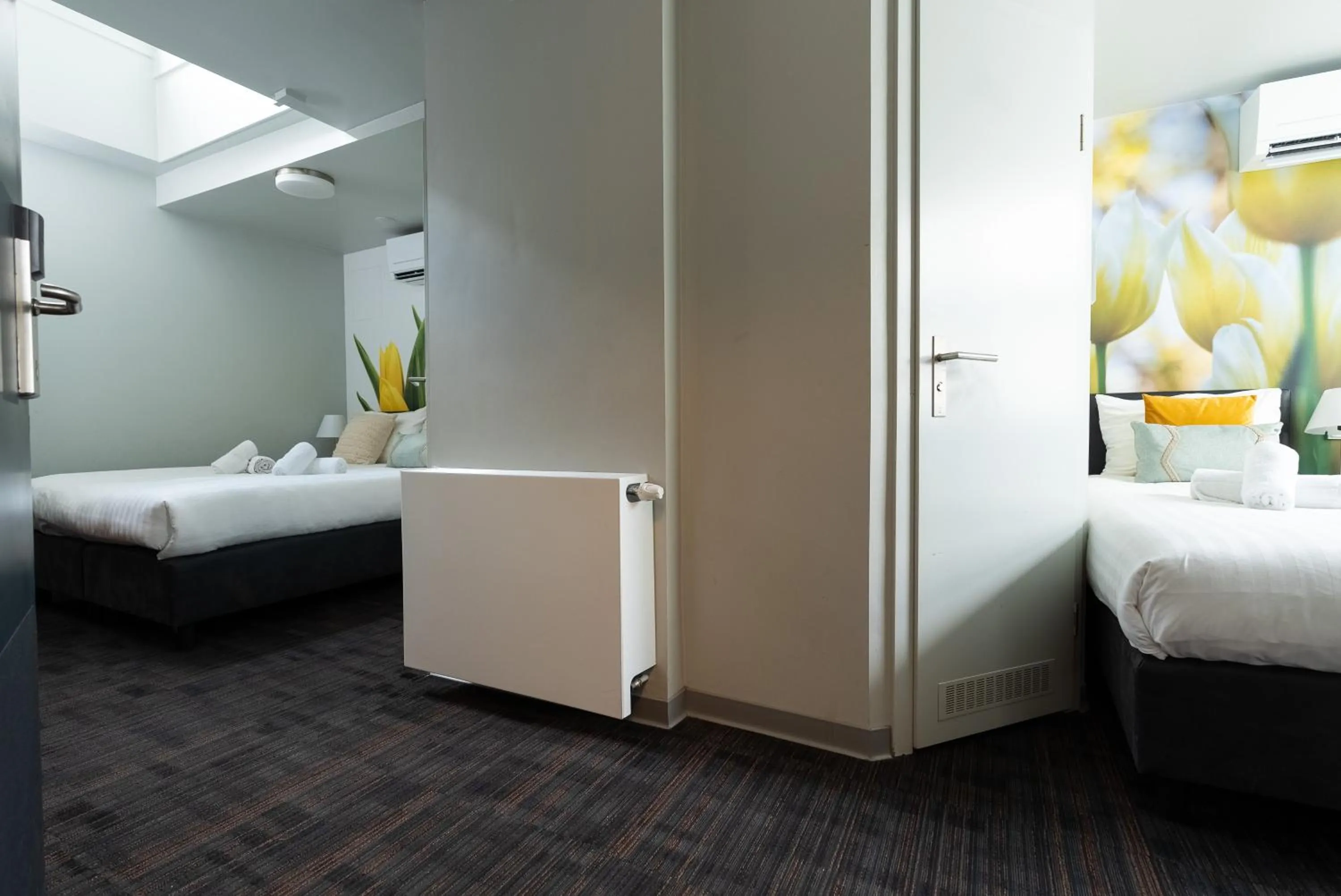 Bed in Multatuli Hotel