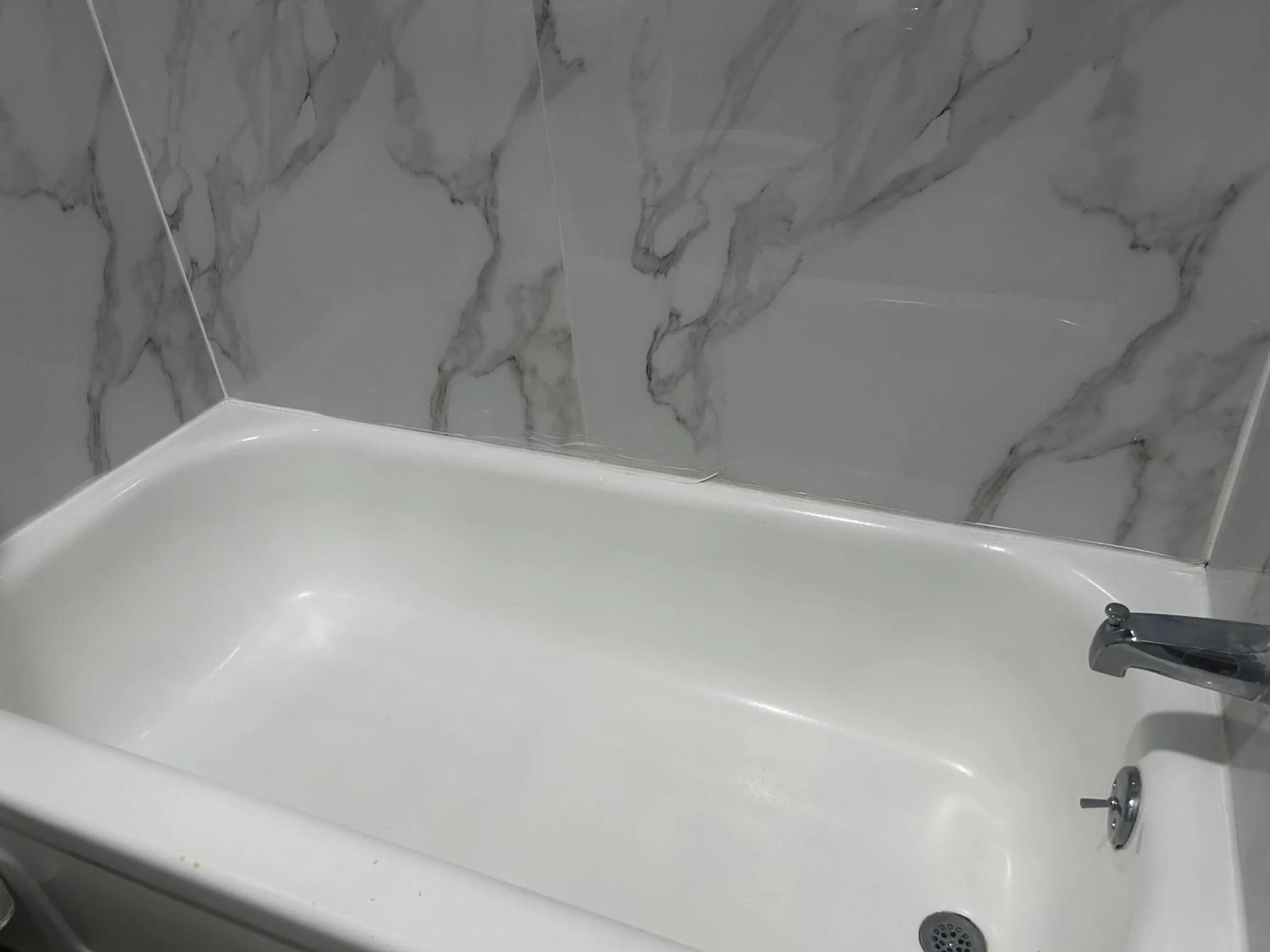 Toilet in Coachman's Inn & Suites