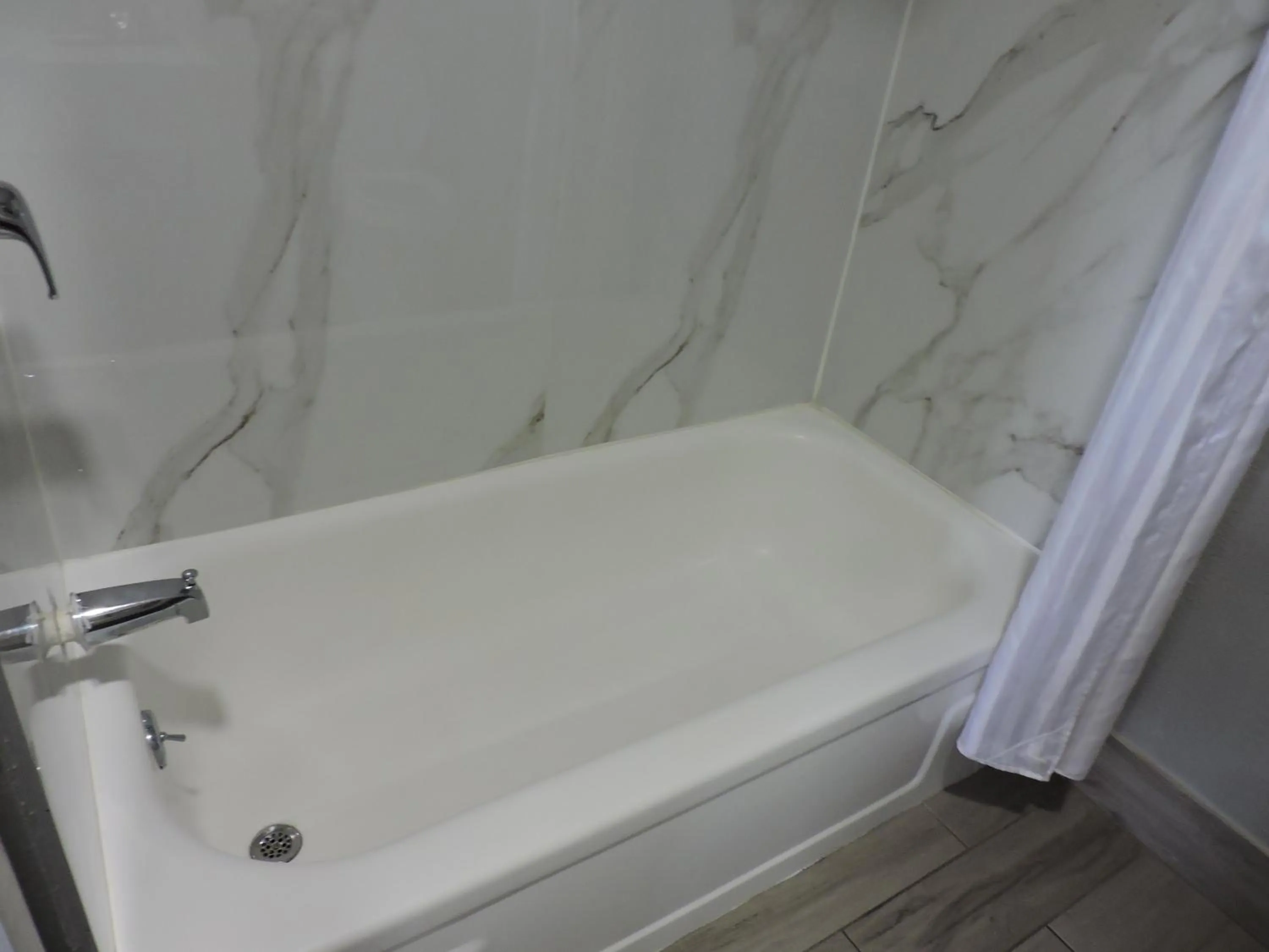 Toilet in Coachman's Inn & Suites