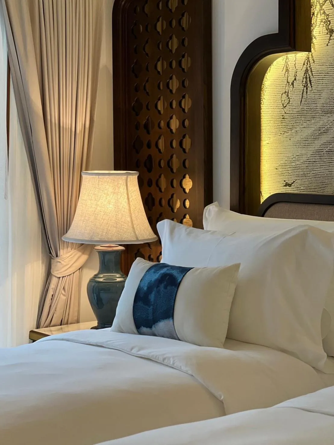 Bed in CHINO@NIMMAN Luxury Boutique Hotel