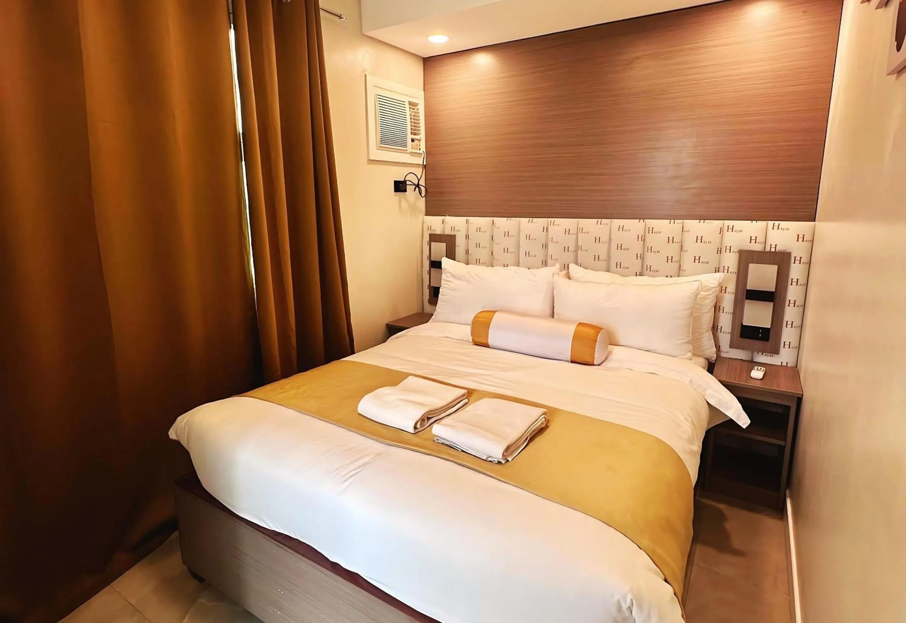 Bed in Hayat Sky Towers