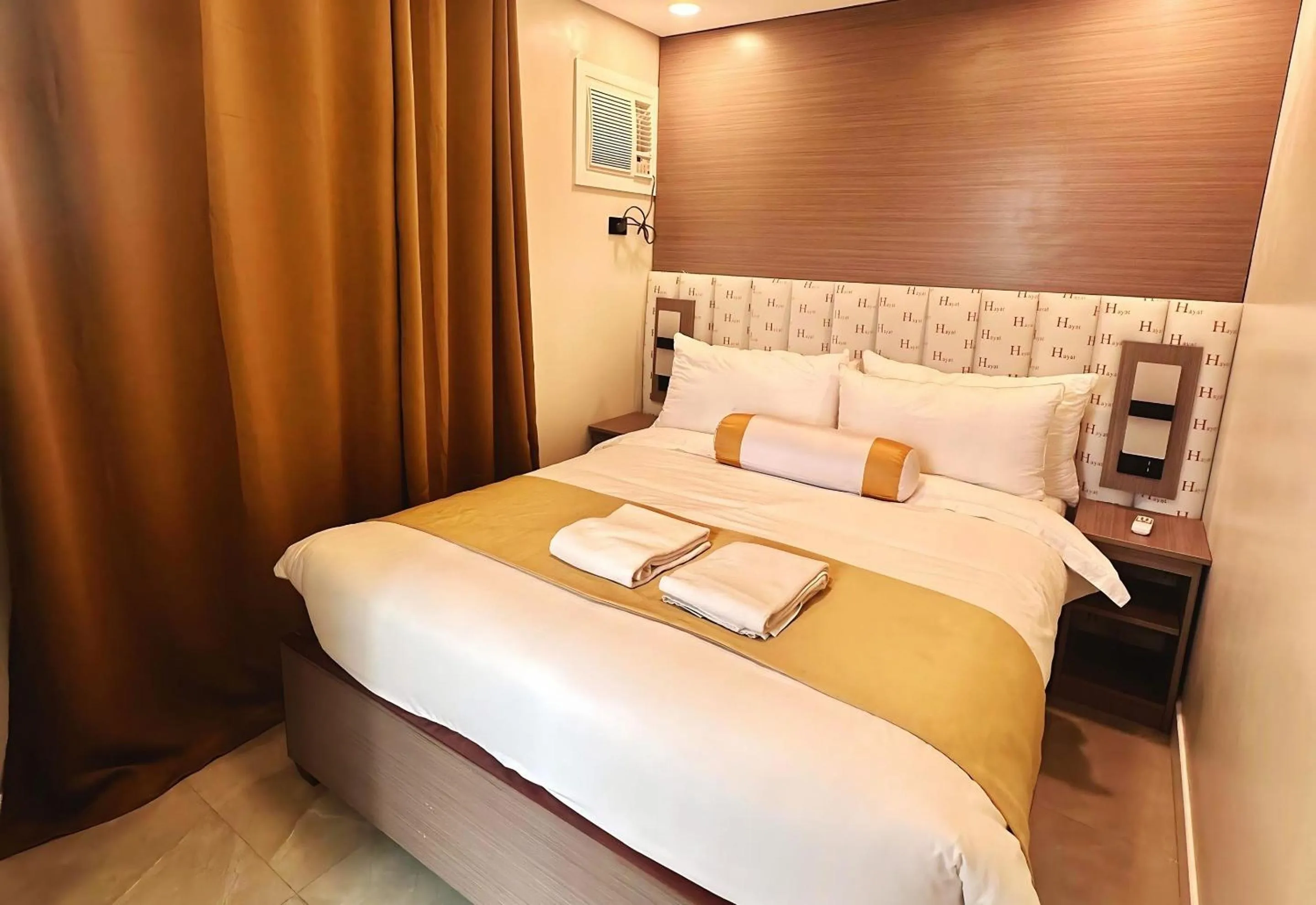 Bed in Hayat Sky Towers