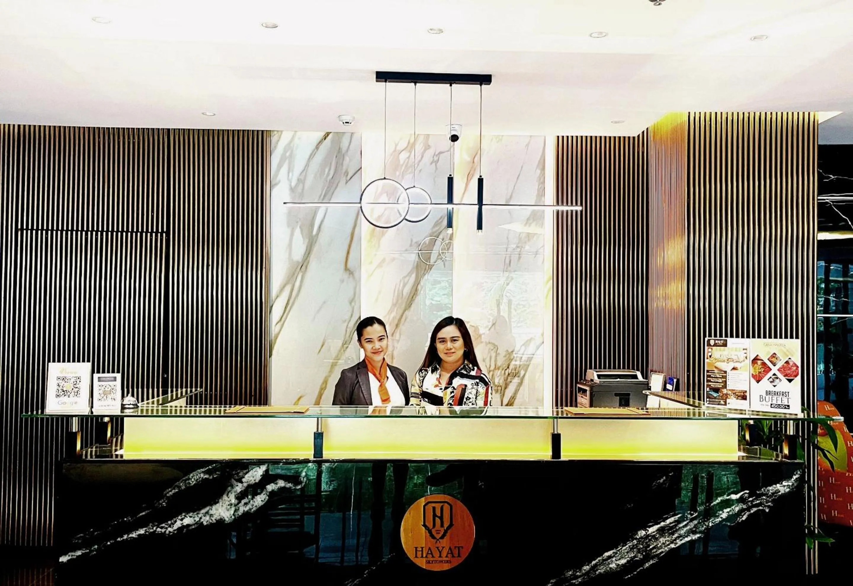 Property logo or sign in Hayat Sky Towers