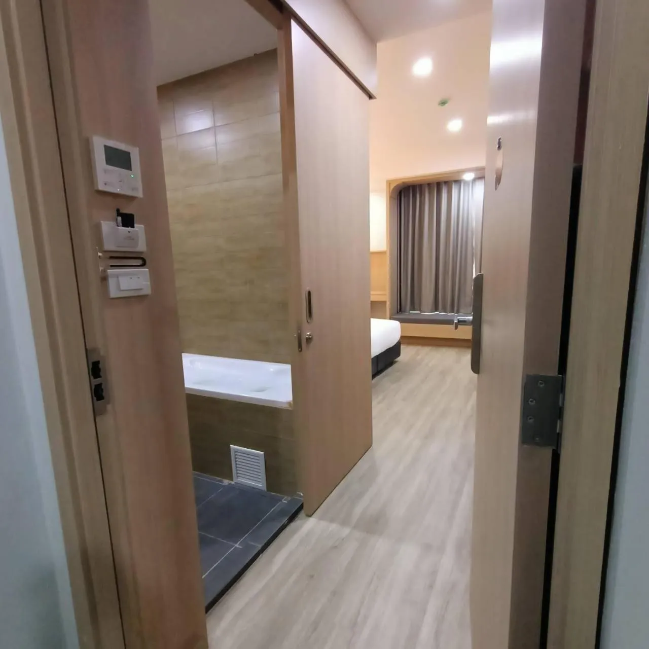 Photo of the whole room, Bed in Mayflower Grande Suite Hotel