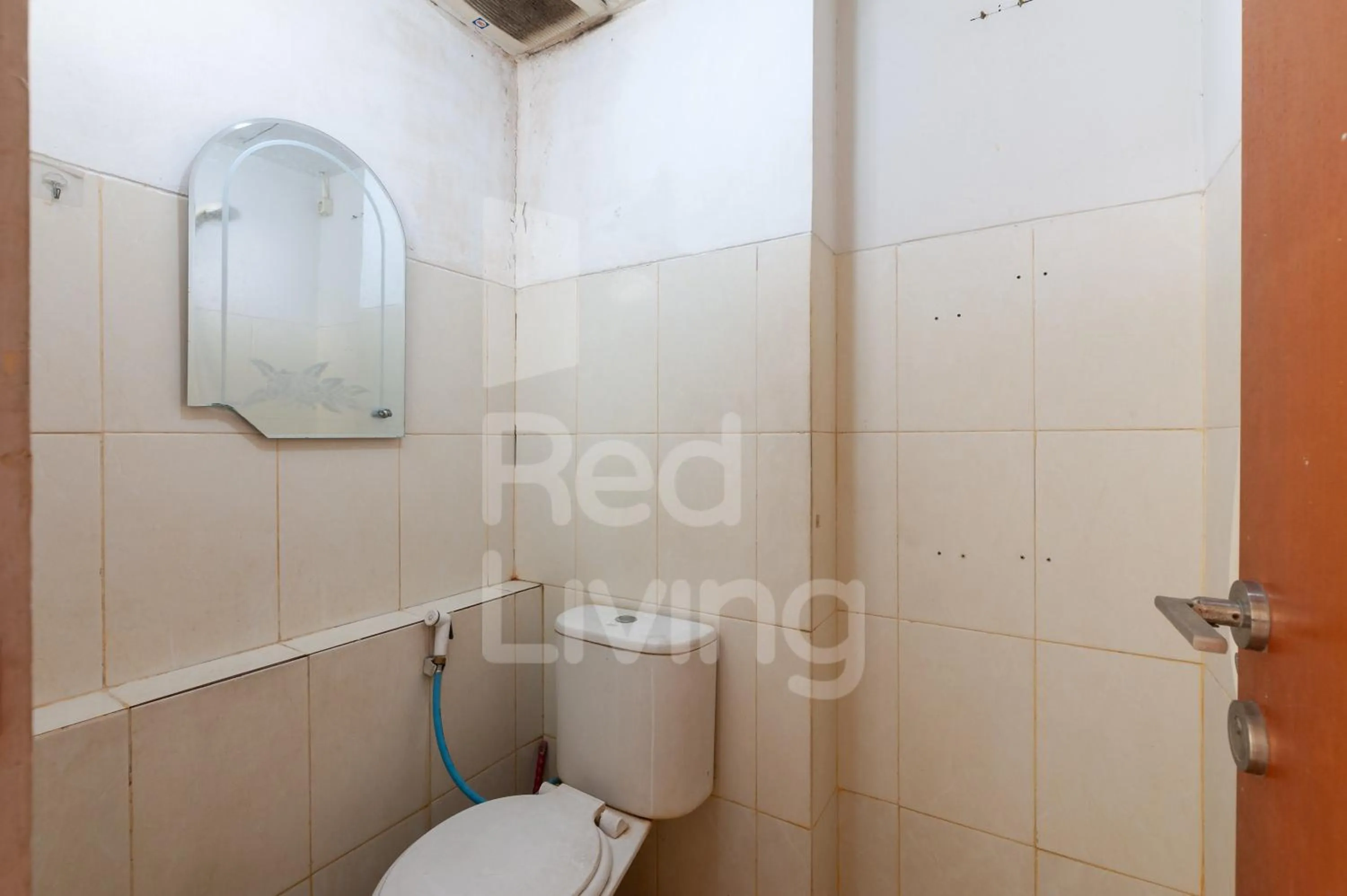 Bathroom in RedLiving Apartemen Green Lake View Ciputat - Aurora Rooms