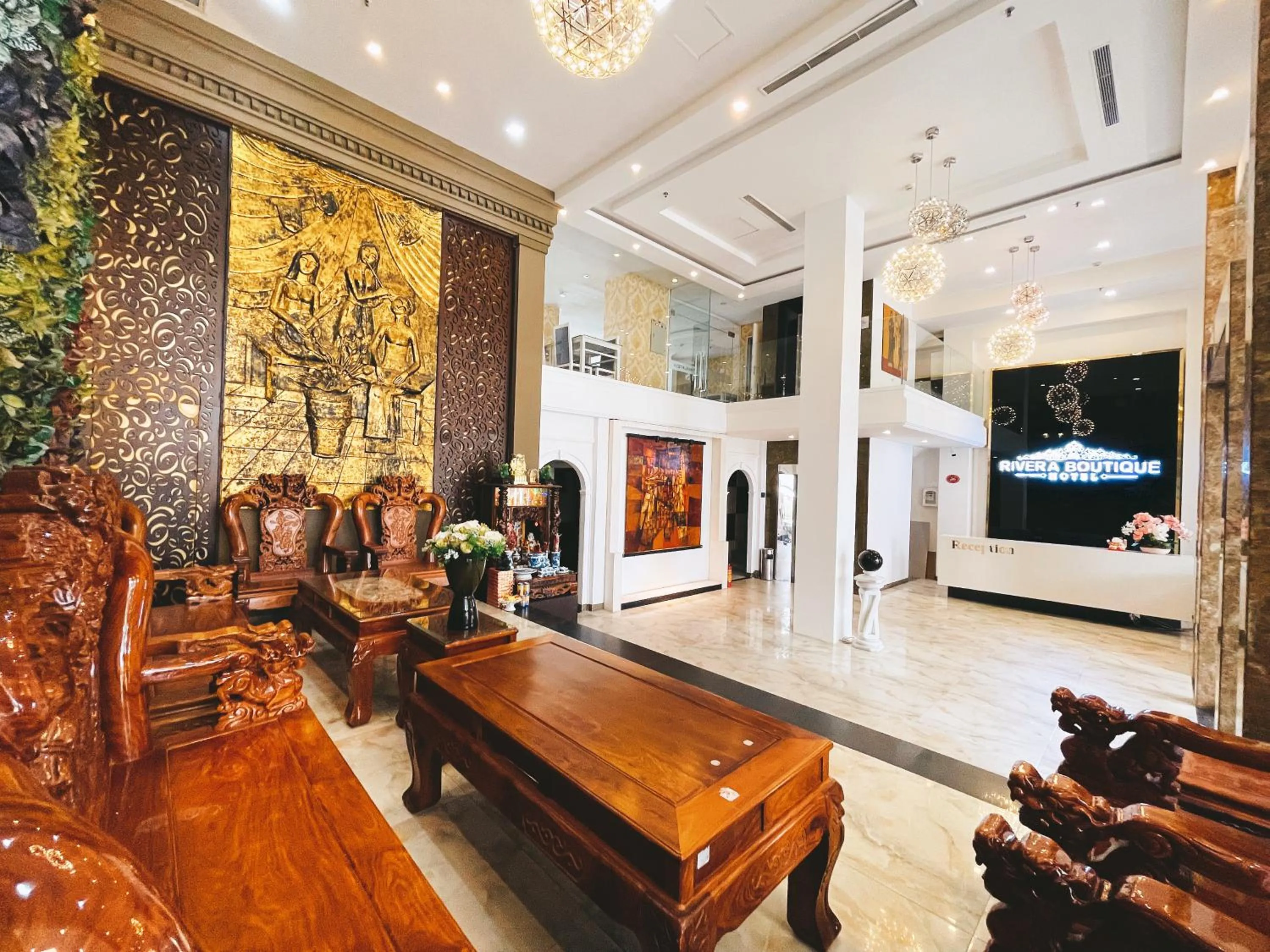 Communal lounge/ TV room in Rivera Boutique Hotel