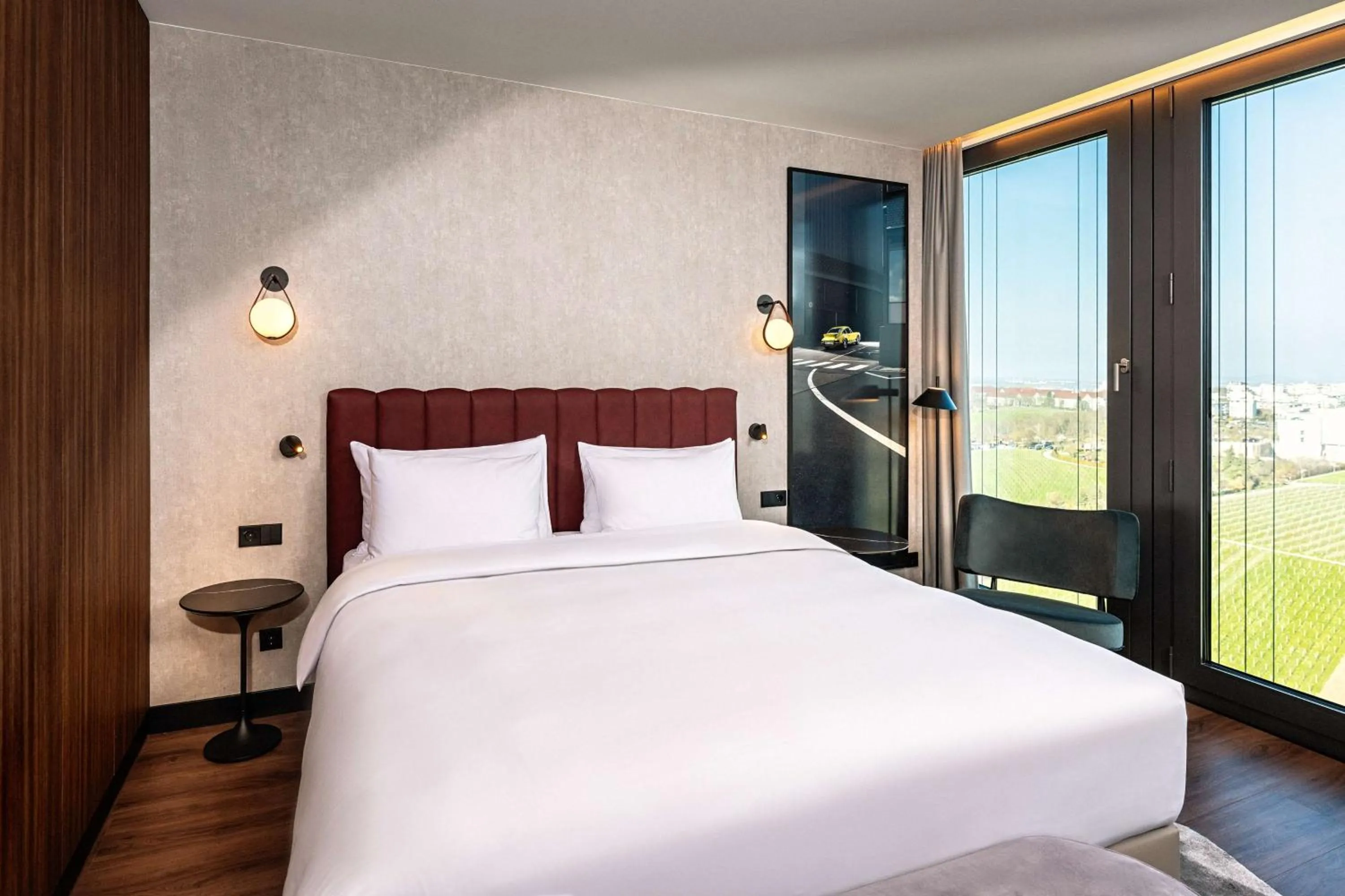 Bedroom, Bed in Radisson Blu Hotel at Porsche Design Tower Stuttgart