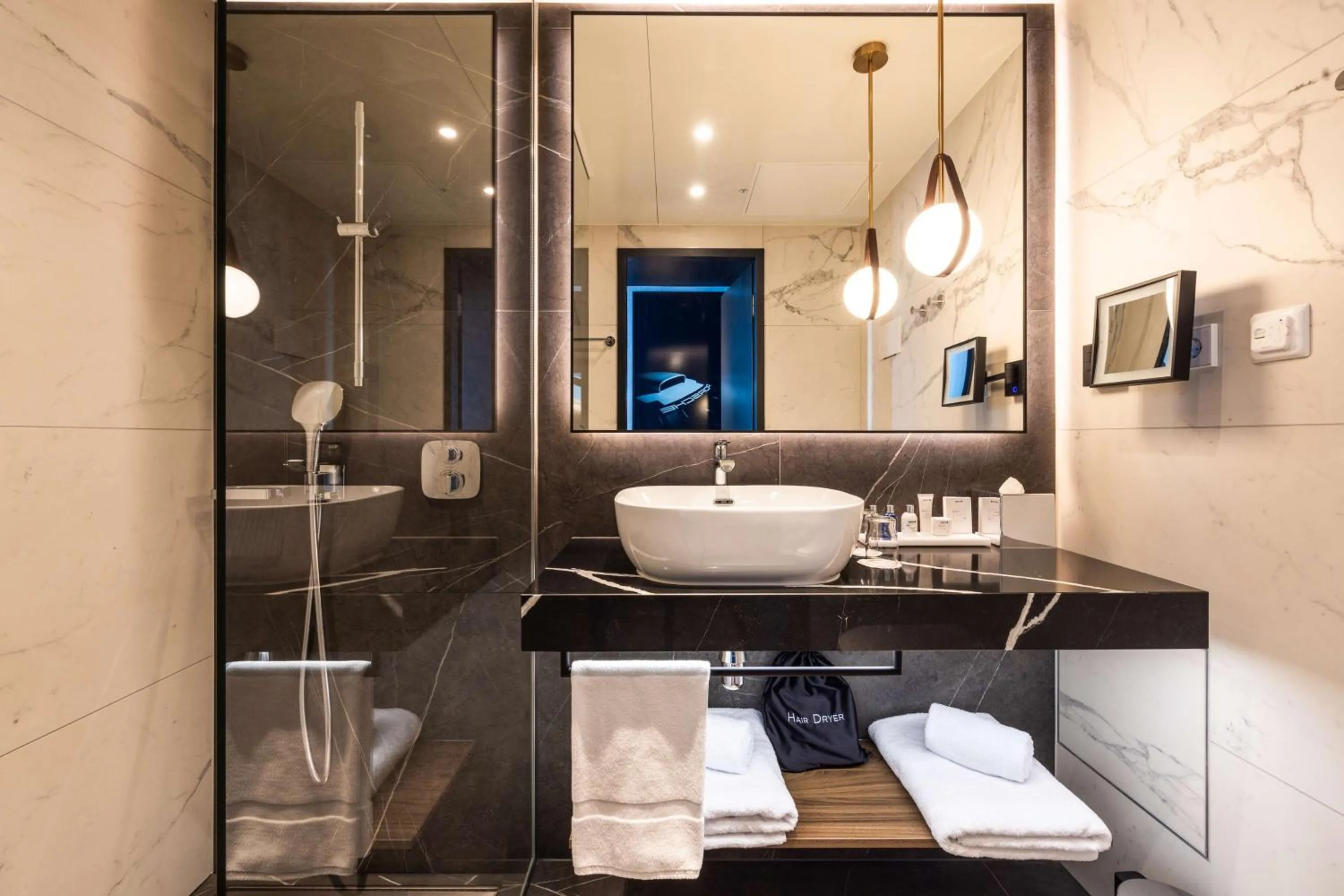 Bathroom in Radisson Blu Hotel at Porsche Design Tower Stuttgart