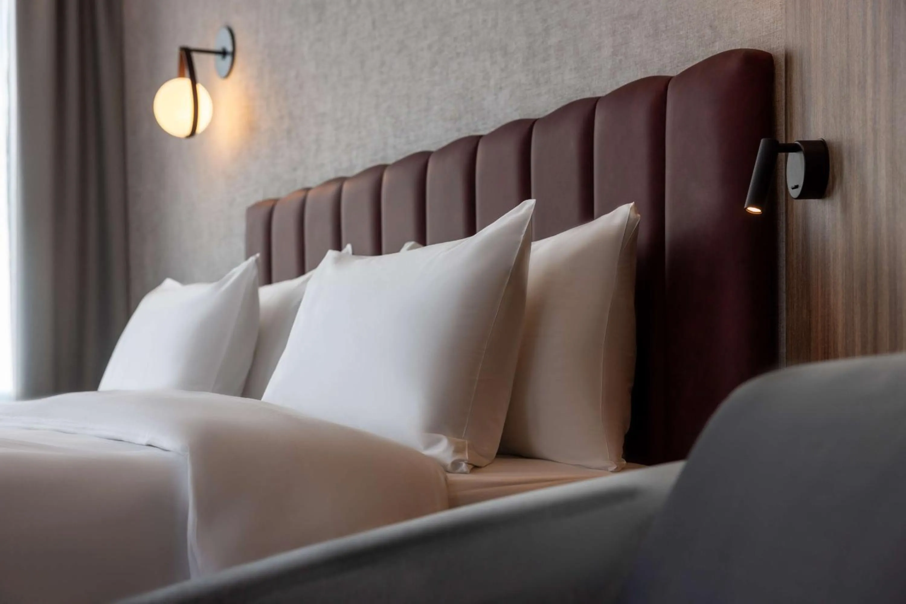 Photo of the whole room, Bed in Radisson Blu Hotel at Porsche Design Tower Stuttgart