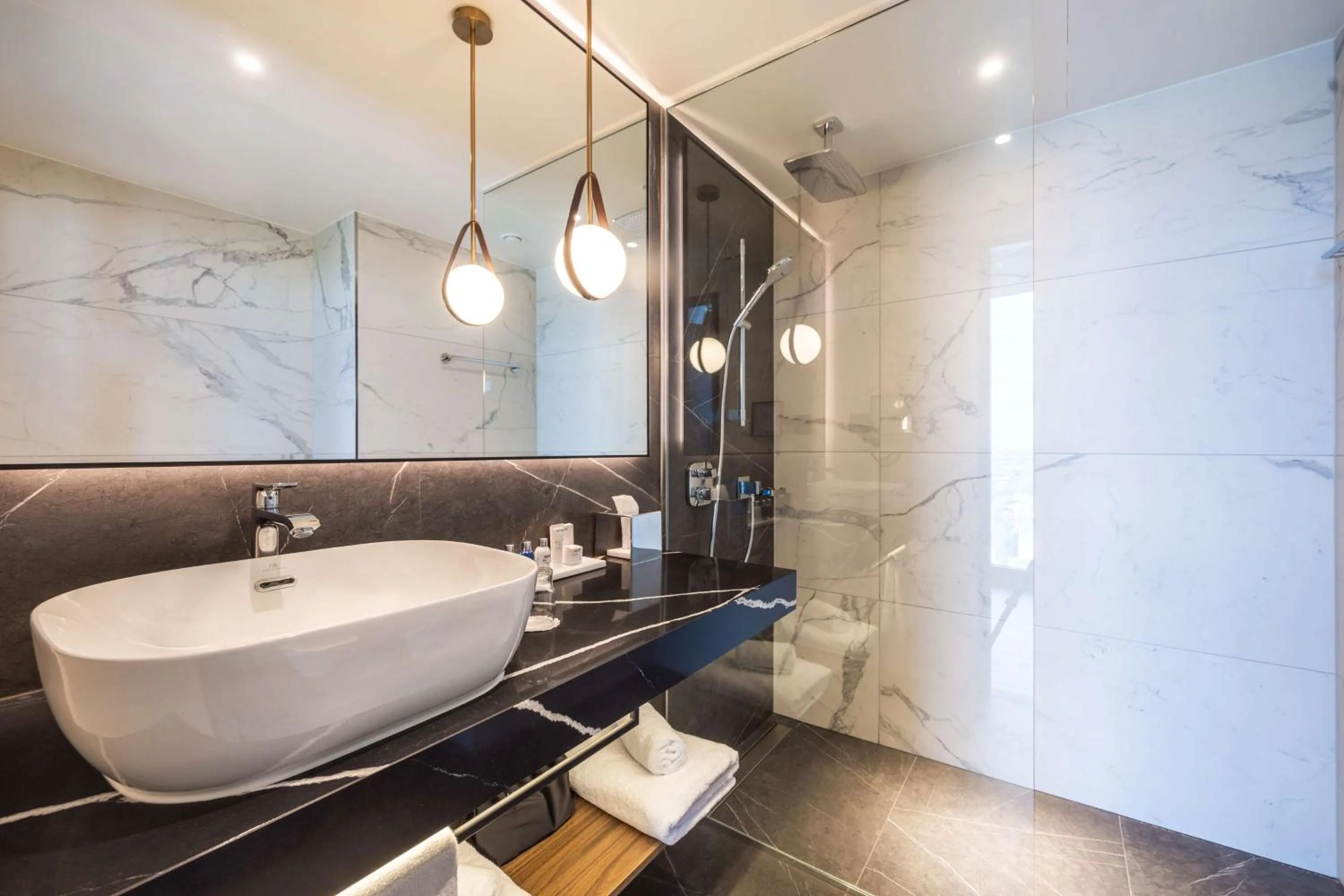 Bathroom in Radisson Blu Hotel at Porsche Design Tower Stuttgart
