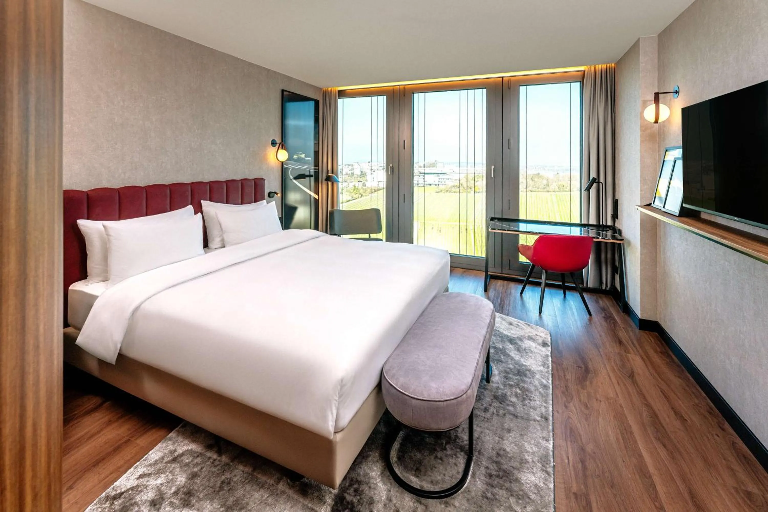 Bedroom, Bed in Radisson Blu Hotel at Porsche Design Tower Stuttgart