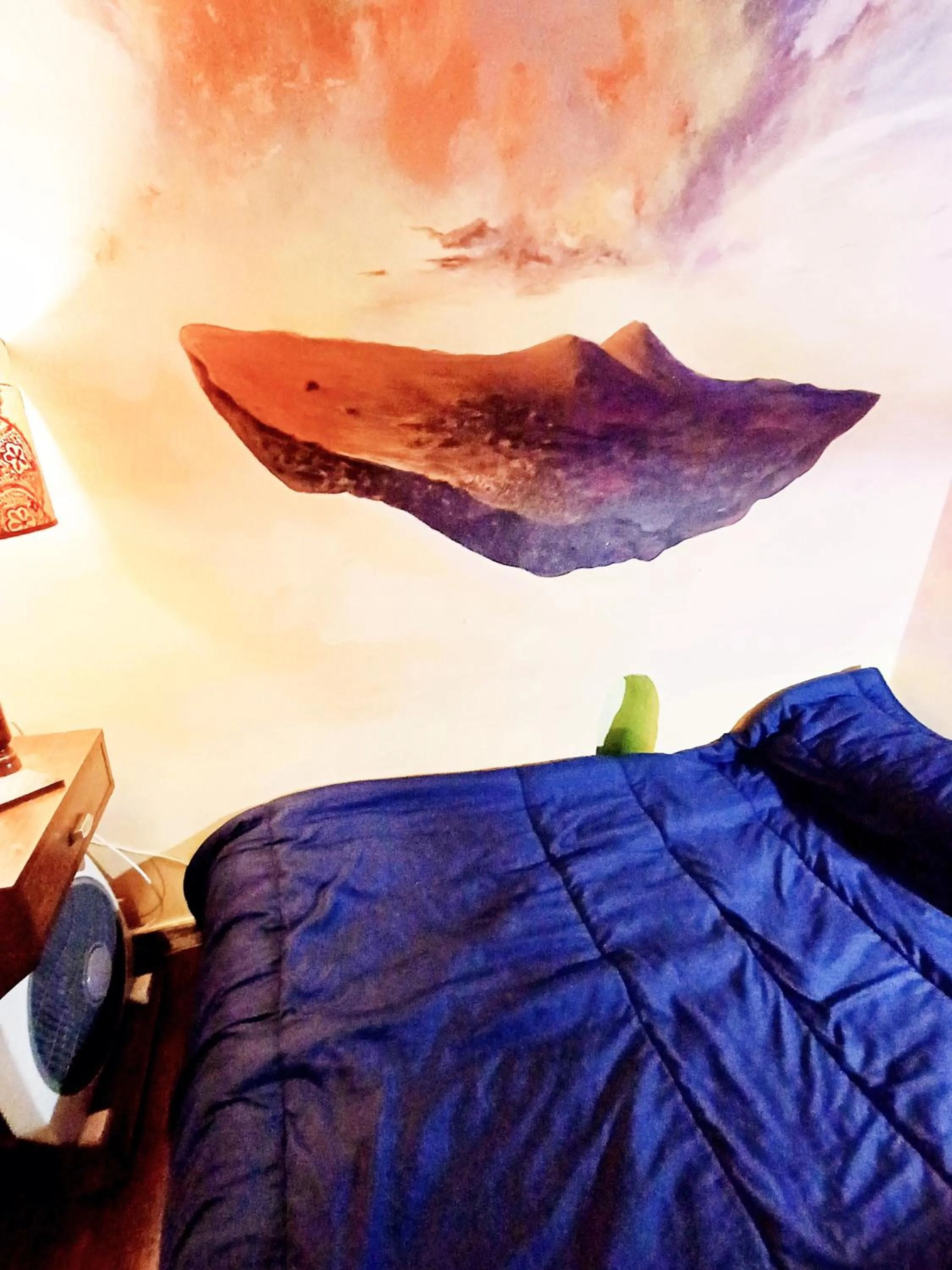 Bed in GoldenCube Guest House