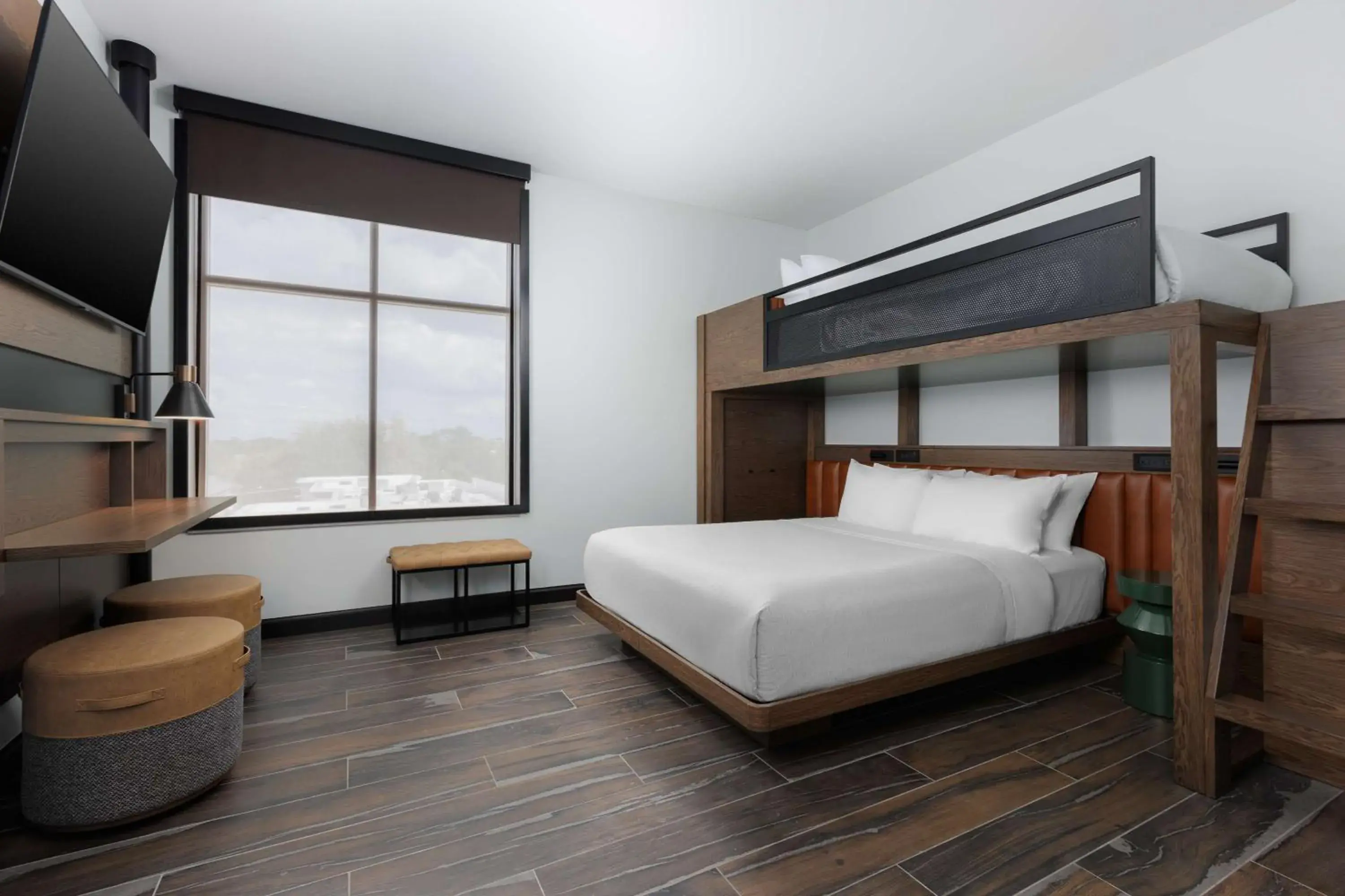 Queen Bed and Twin Bunk Bed in Motto By Hilton Bentonville Downtown Queen Bed and Twin Bunk Bed in Motto By Hilton Bentonville Downtown