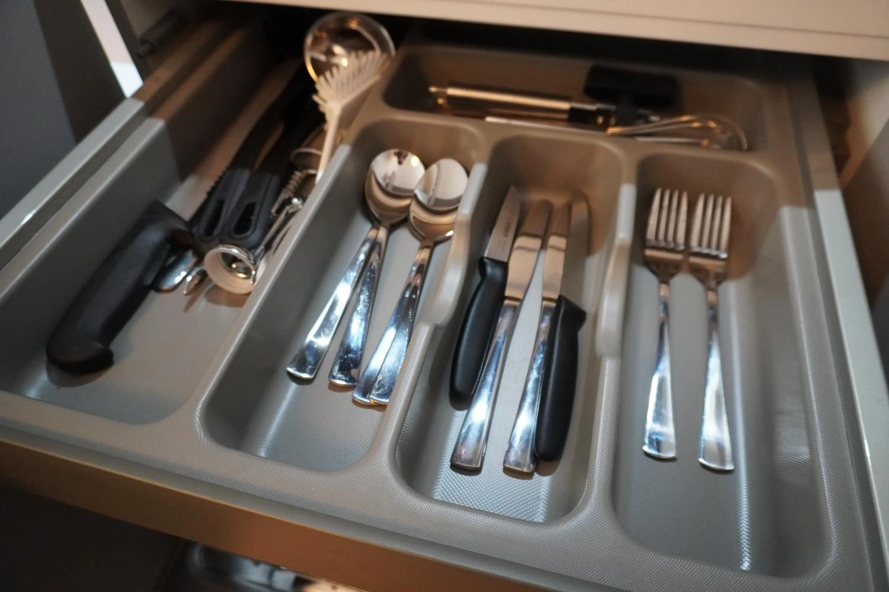 Kitchen or kitchenette in Fair n Square Hotel 24 Stunden Self-Check In