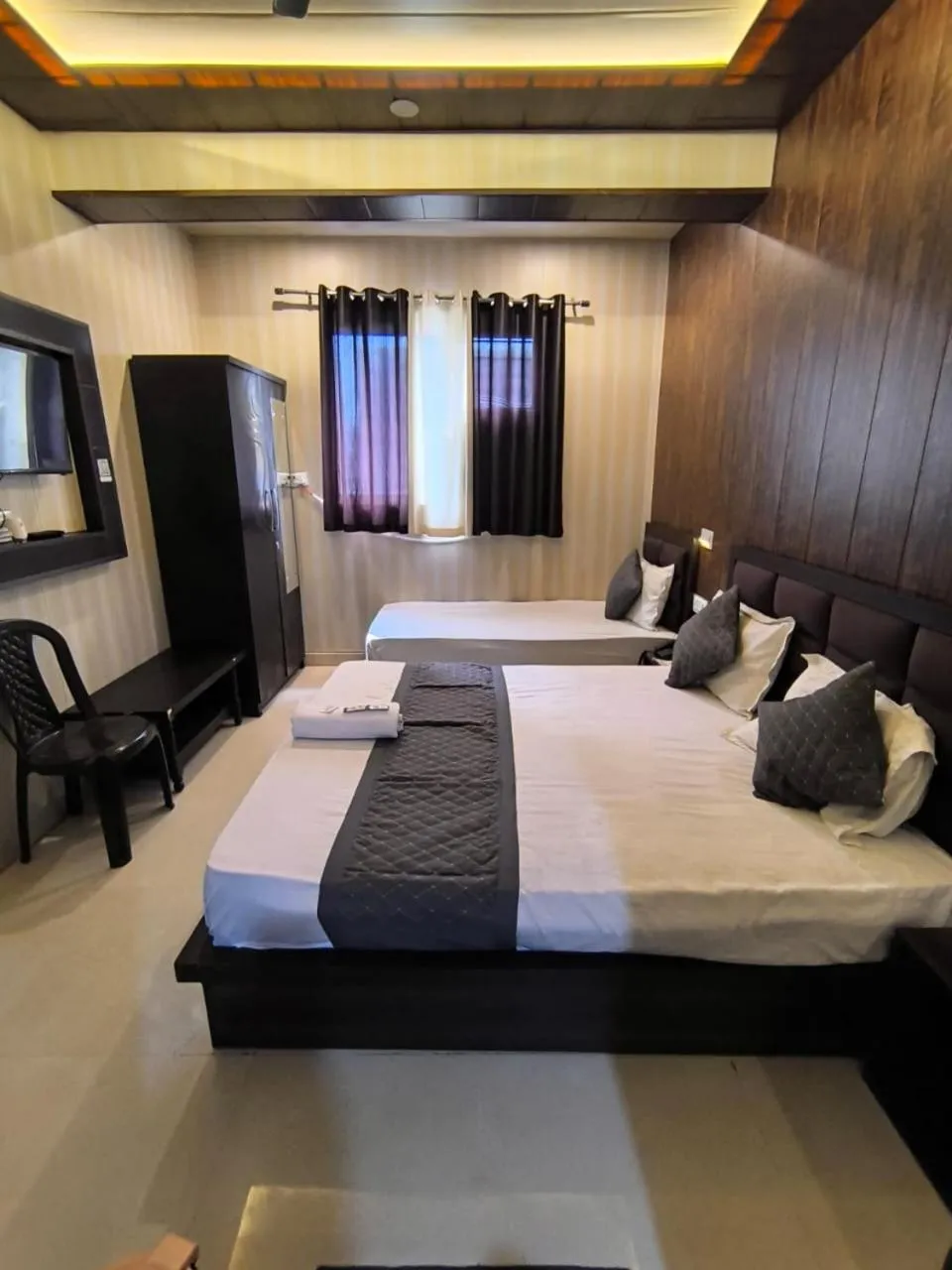 Bed in Hotel Goyal Palace