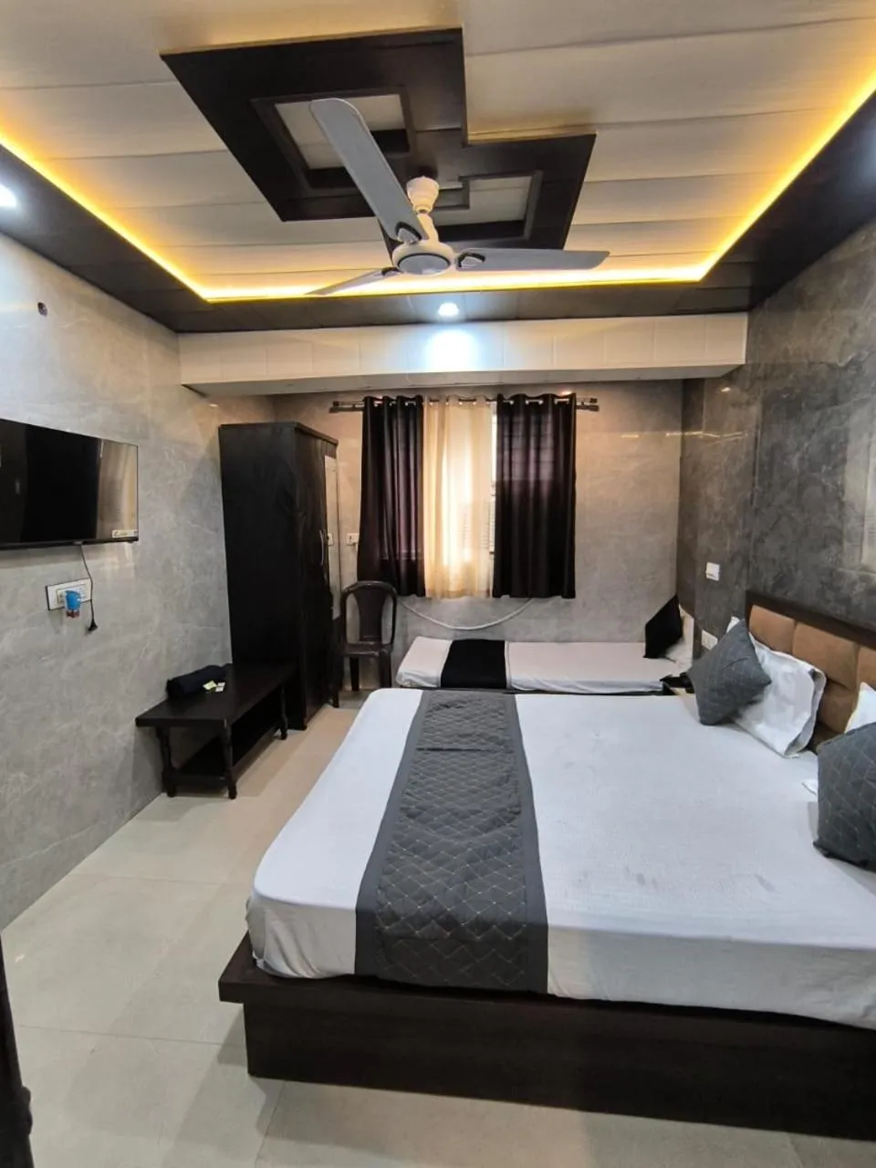 Bed in Hotel Goyal Palace