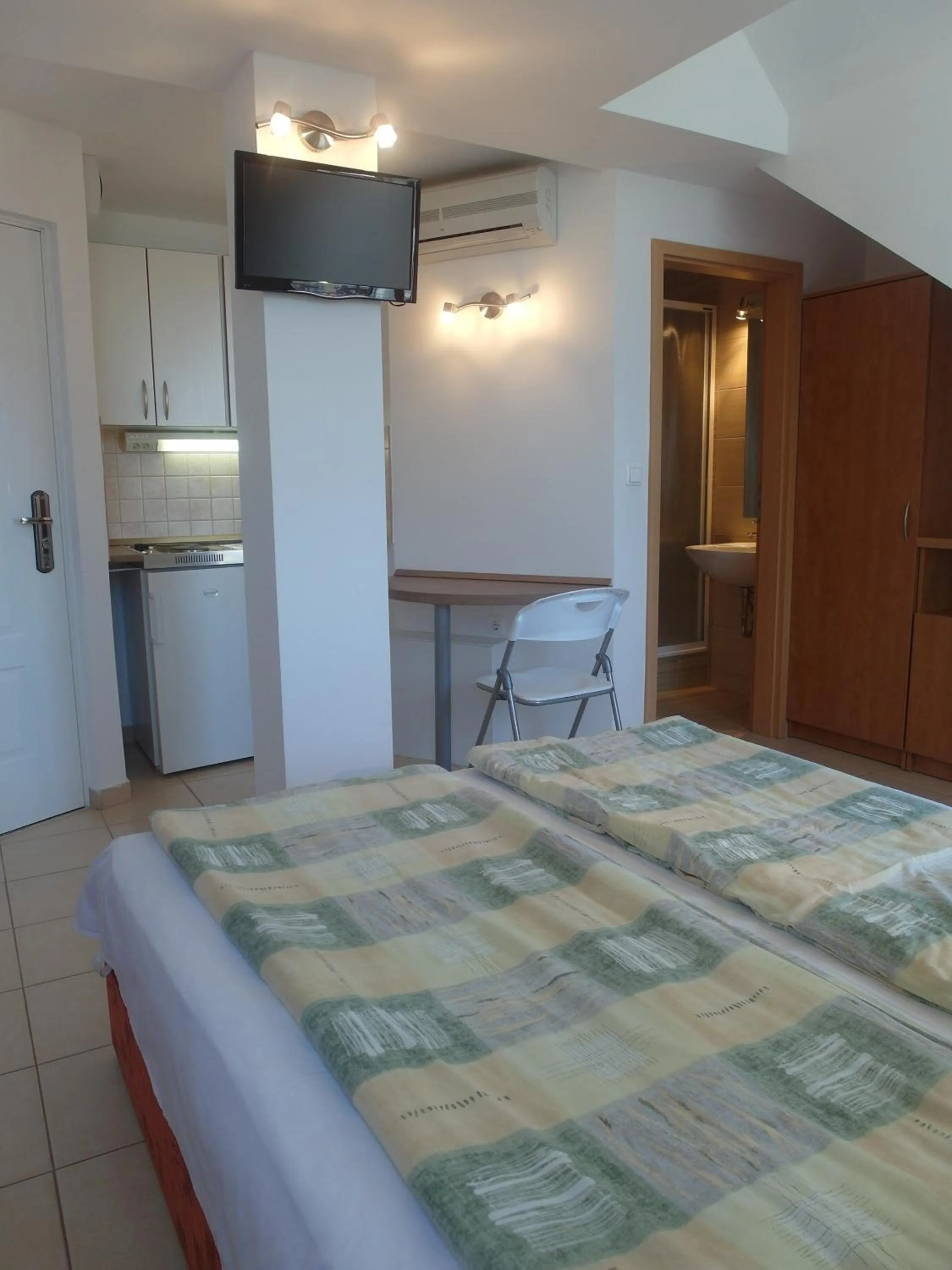 Bed in Tip-Top Apartmenthouse