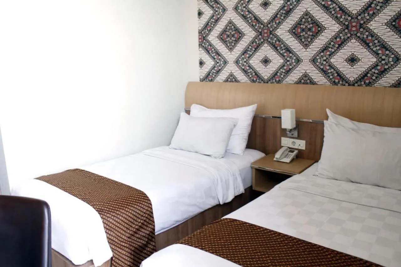 Bed in D'Kalpa Hotel Demangan Yogyakarta