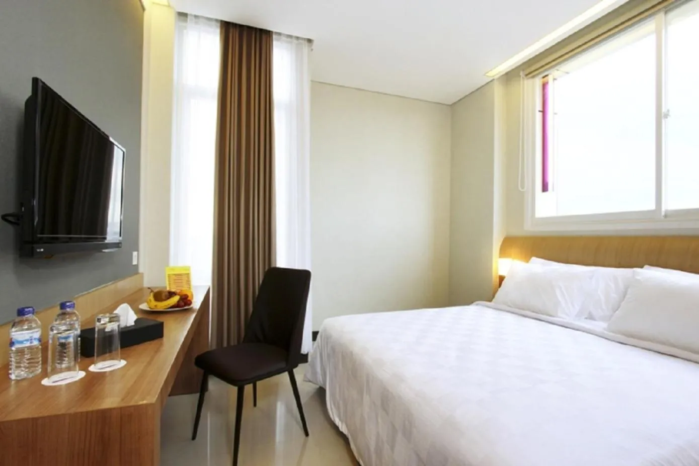Bed in D'Kalpa Hotel Demangan Yogyakarta