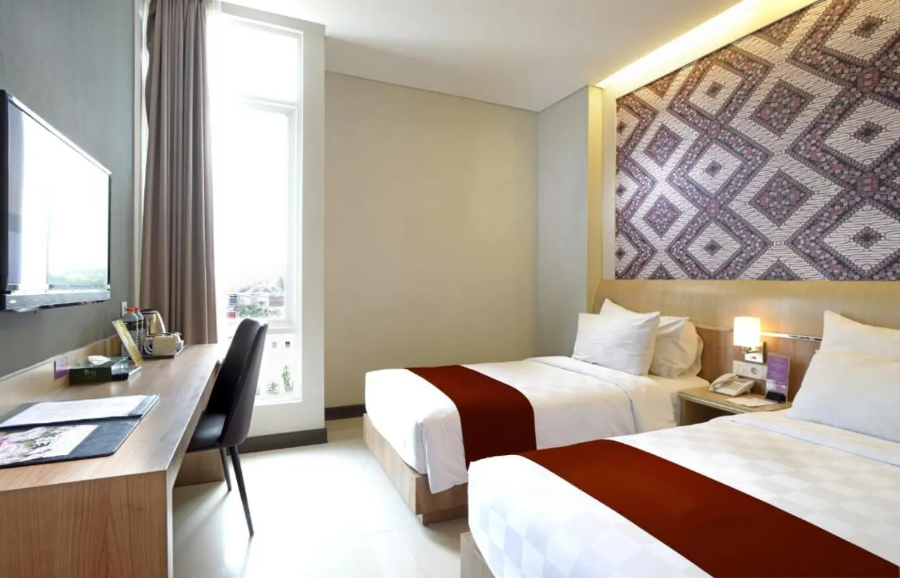 Bed in D'Kalpa Hotel Demangan Yogyakarta